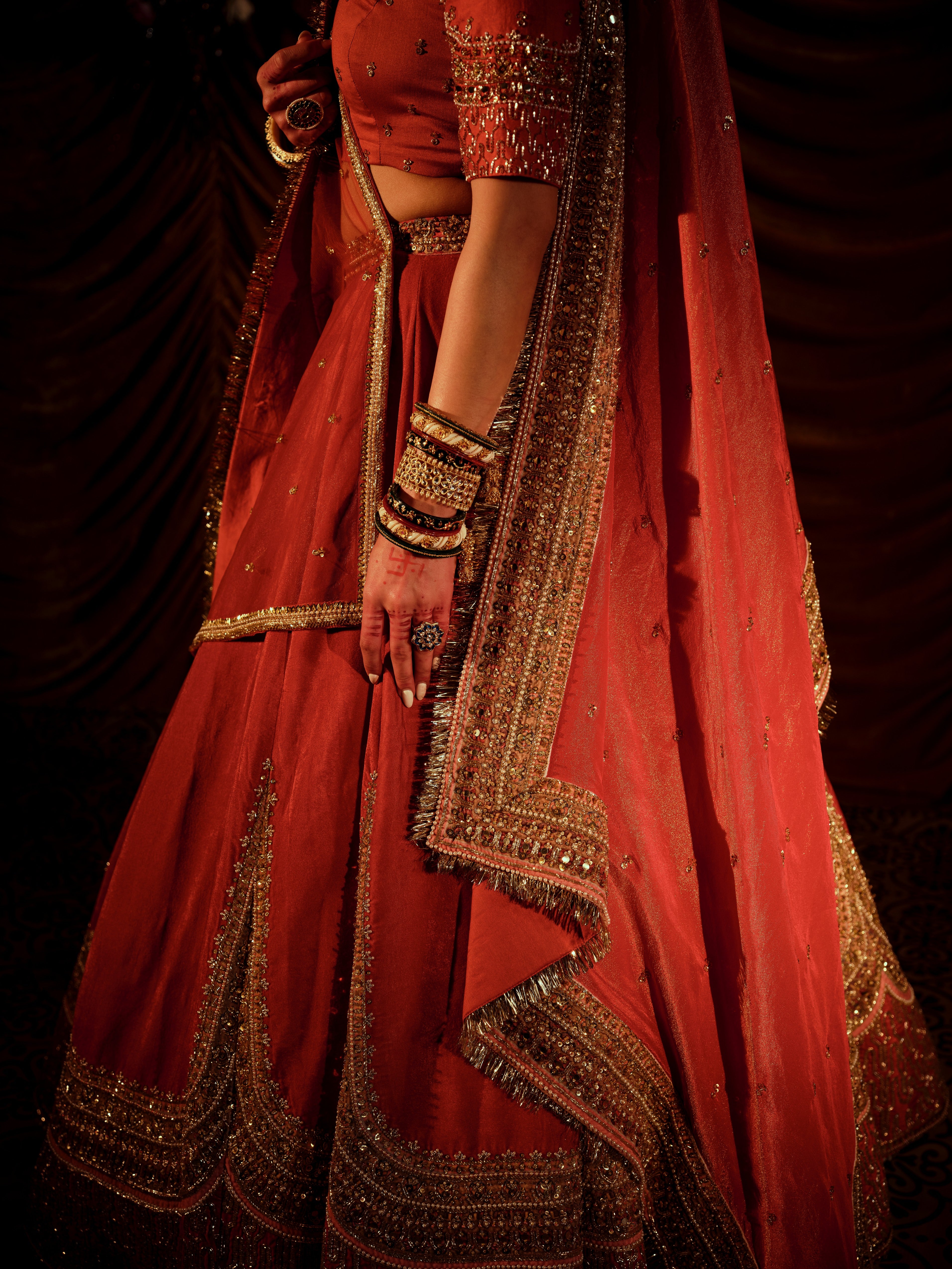 Solid red bridal lehenga with 2 dupttas