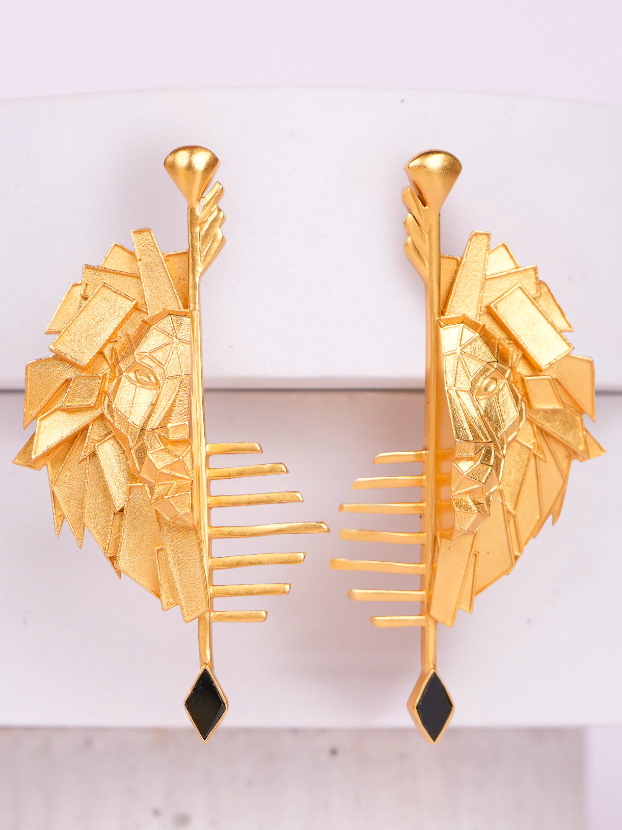 Regal Roar Studs