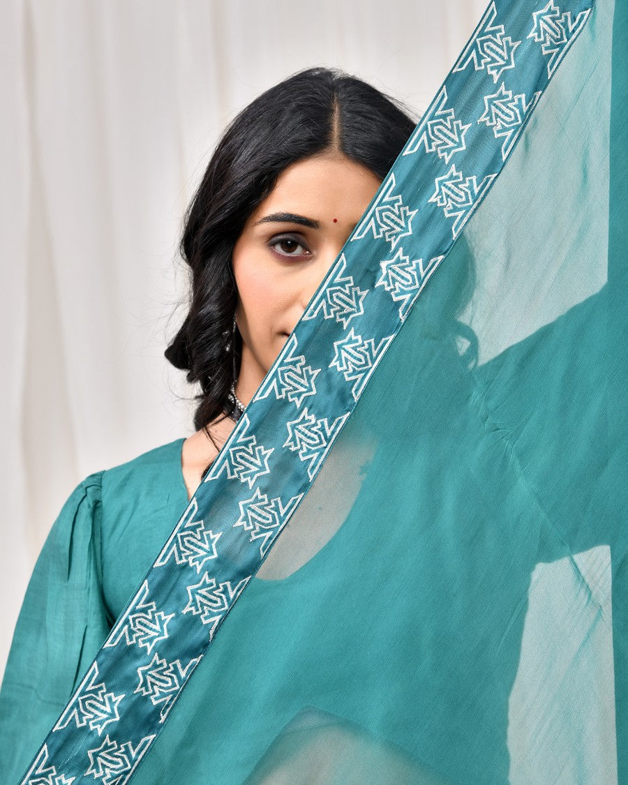Stunning dark sea green digitally printed lehenga and blouse, paired with organza dupatta