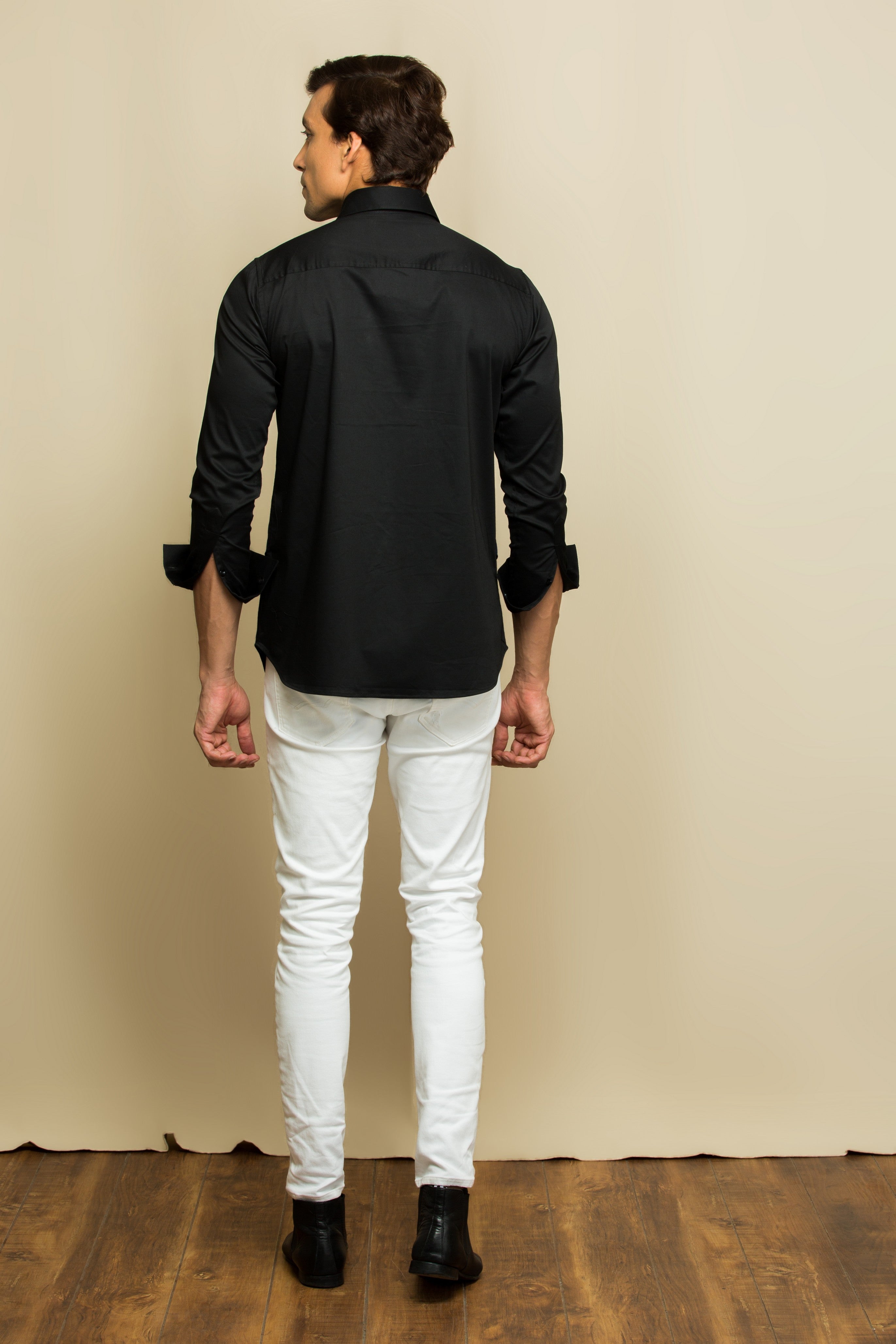 Black shirt with blue chest patch and buttons