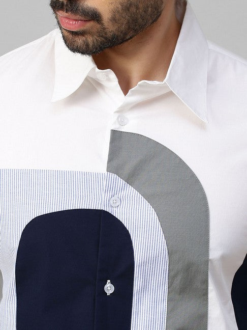 White shirt with dark blue, gray and light blue checks patchwork on chest