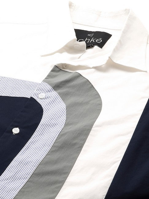 White shirt with dark blue, gray and light blue checks patchwork on chest