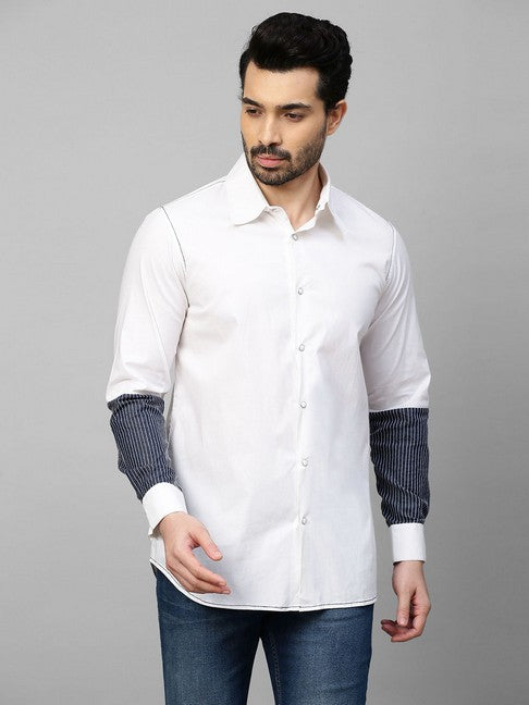 White shirt with dark denim and white stitching patch on sleeves