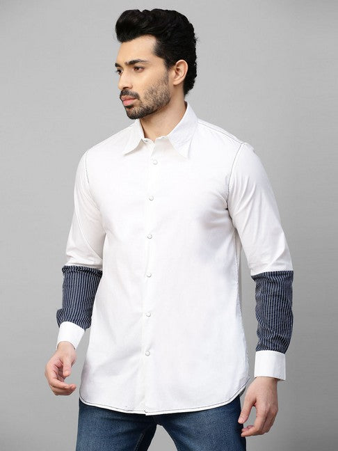 White shirt with dark denim and white stitching patch on sleeves