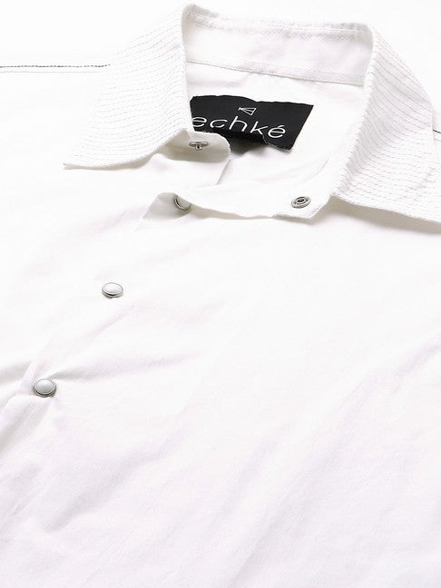 White shirt with dark denim and white stitching patch on sleeves