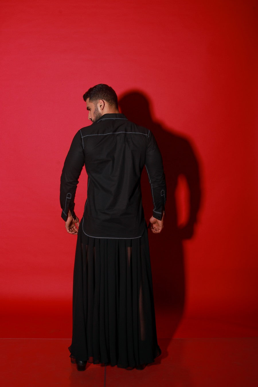 Black shirt with thick white stitching