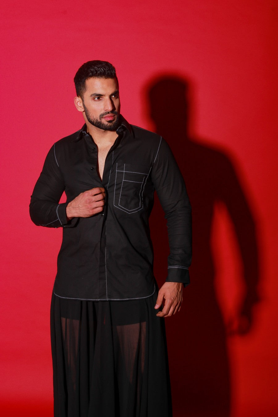 Black shirt with thick white stitching