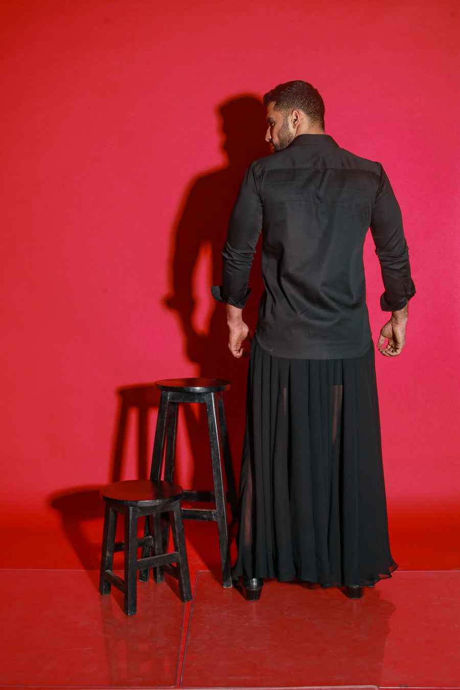 Black full sleeves shirt with slant postman pockets