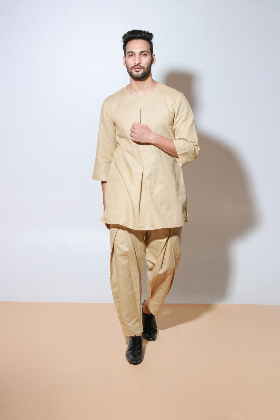 Beige round neck co-ord set with front pleat join feature