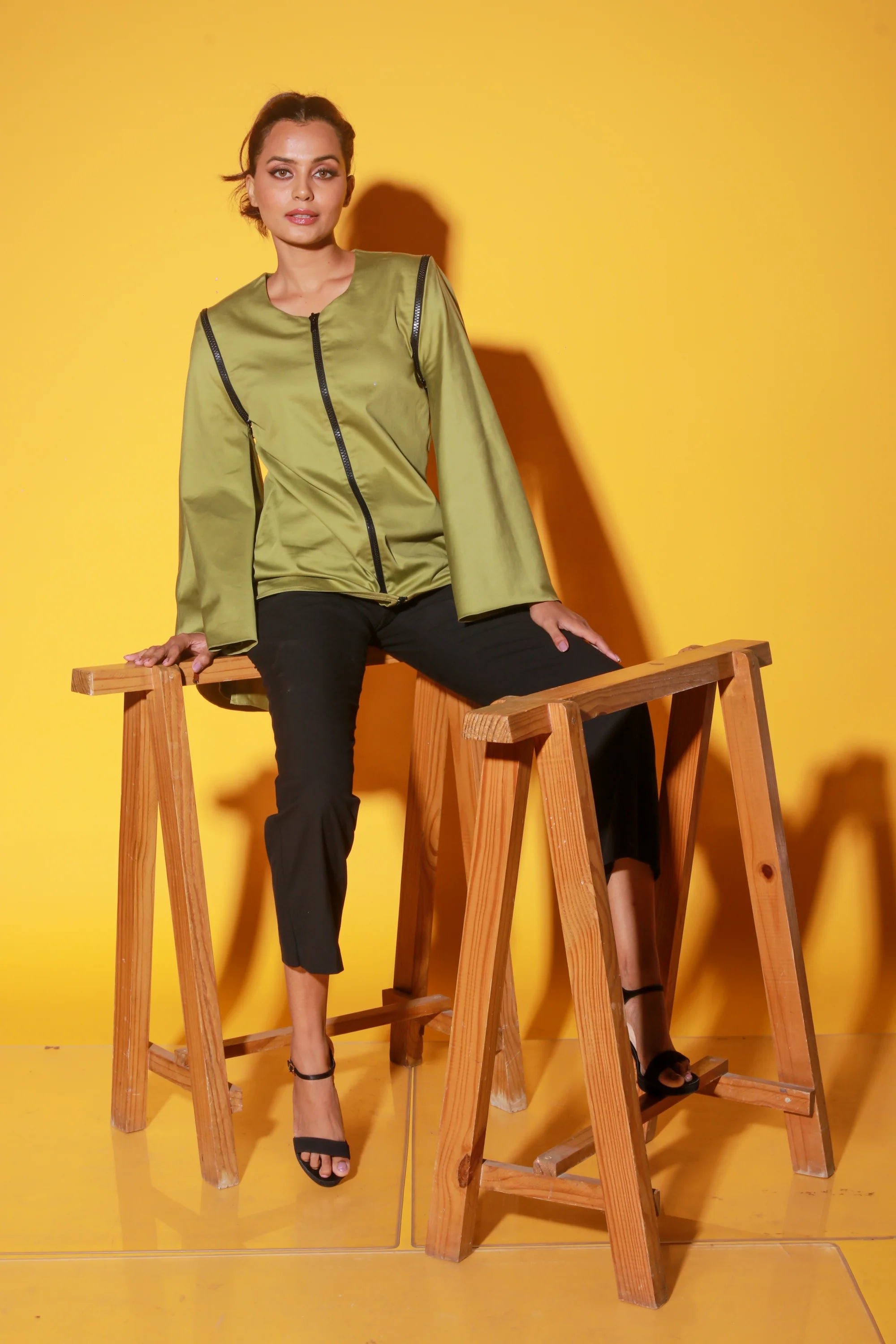 Moss green top with zipper and asymmetric bell sleeves