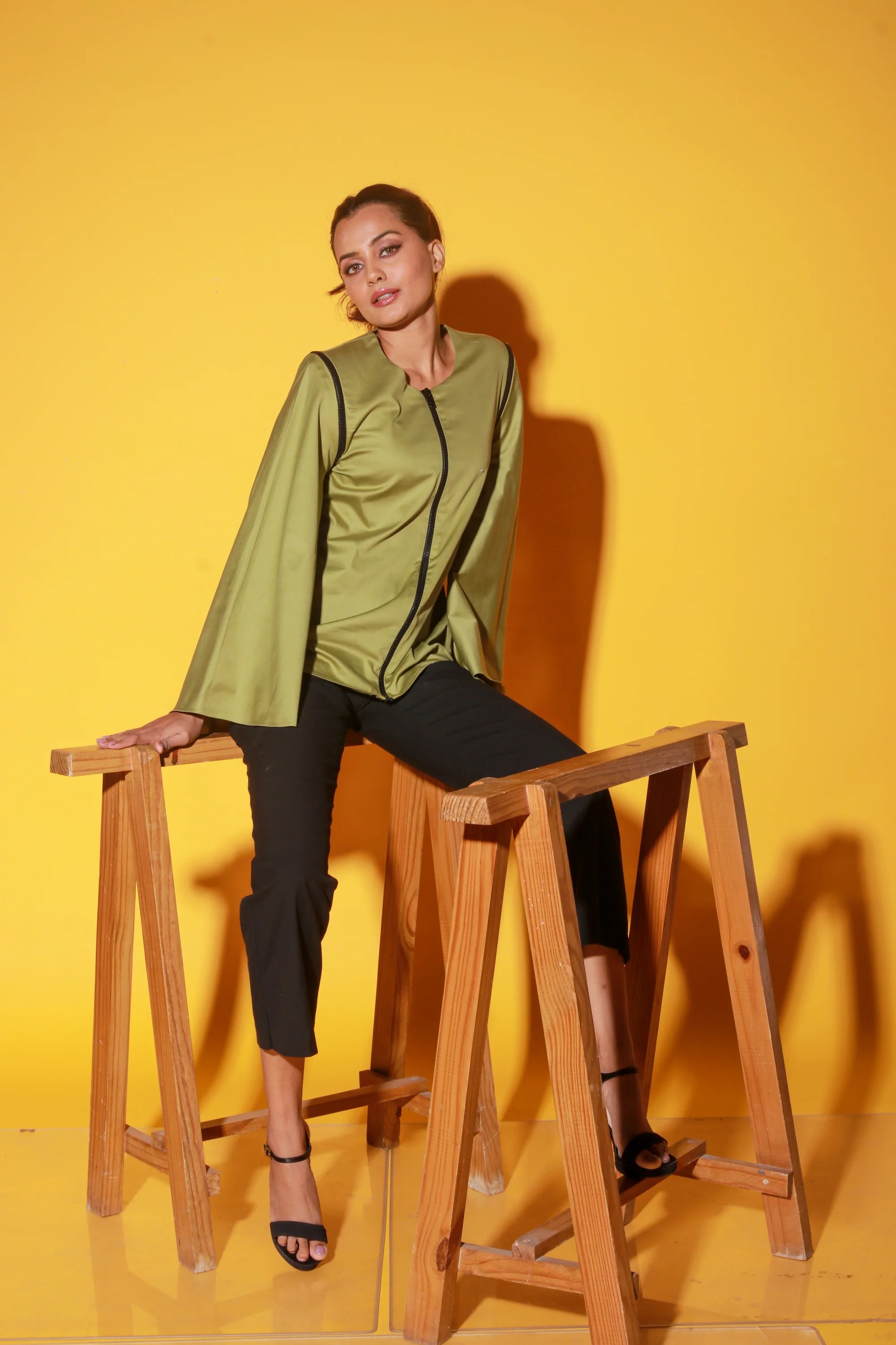 Moss green top with zipper and asymmetric bell sleeves