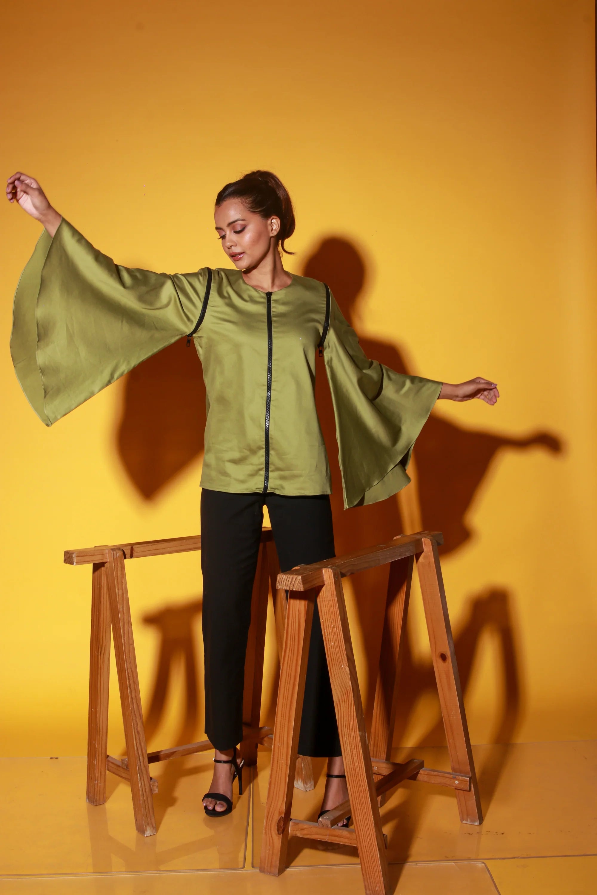 Moss green top with zipper and asymmetric bell sleeves