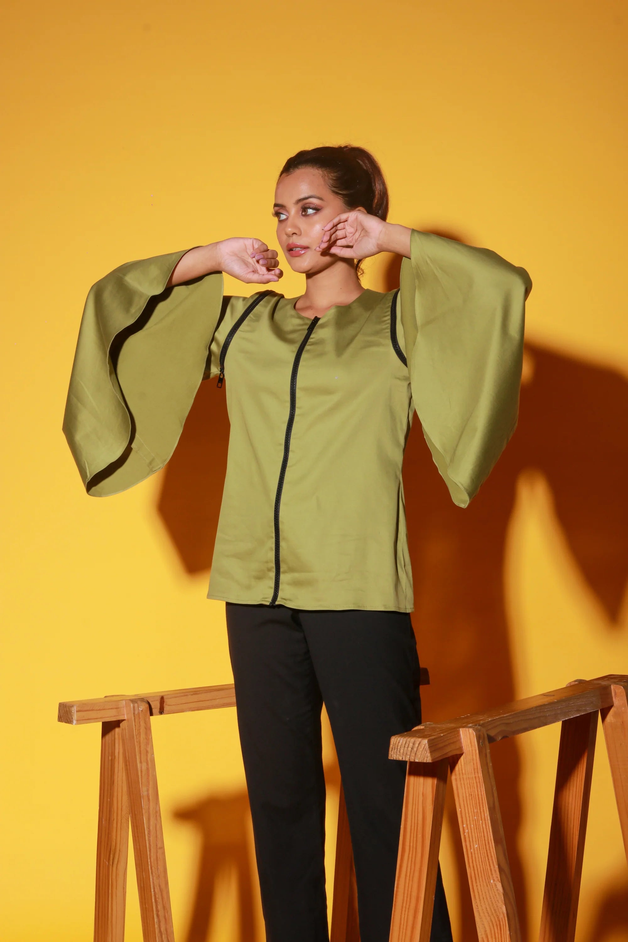 Moss green top with zipper and asymmetric bell sleeves