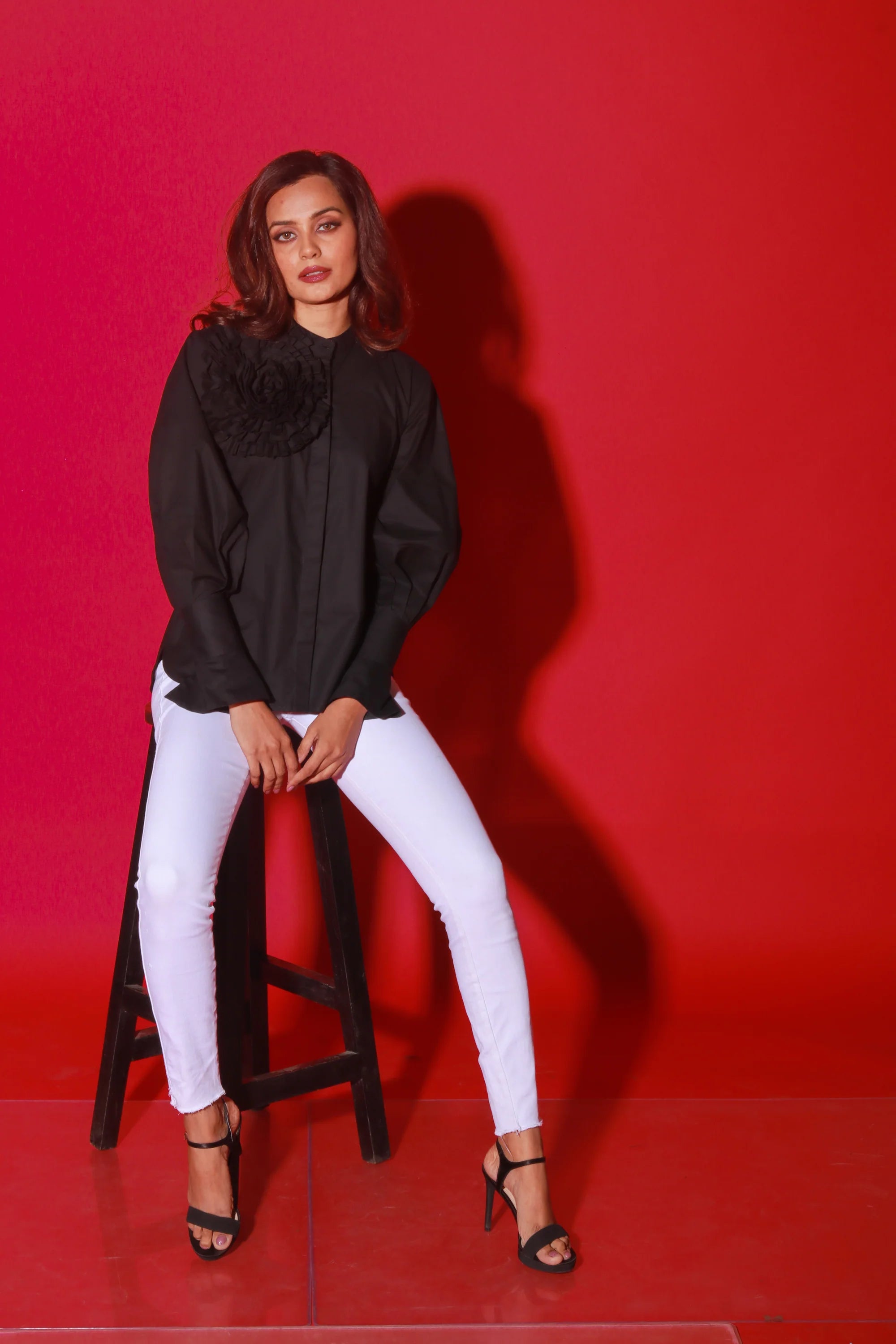 Black chinese collar top with flower feature