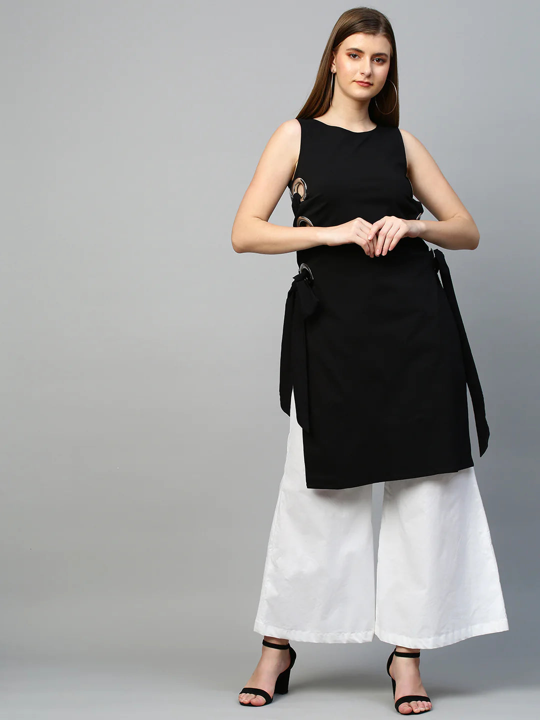 Top with eyelets tie-up feature and flared pants co-ord set