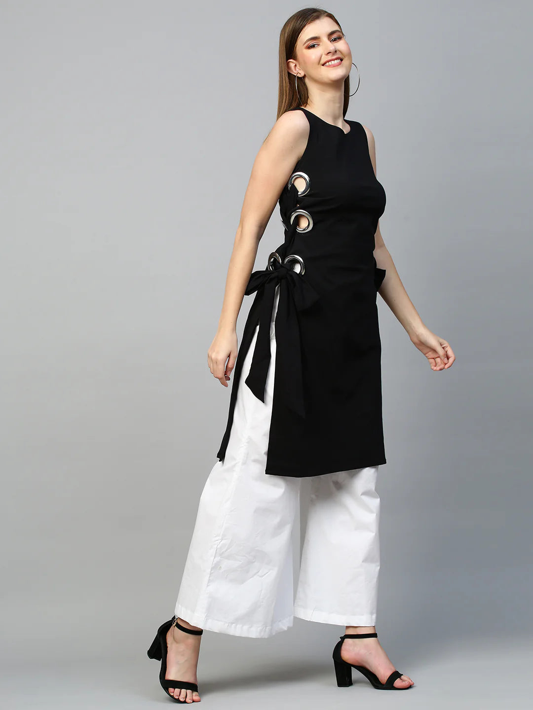 Top with eyelets tie-up feature and flared pants co-ord set