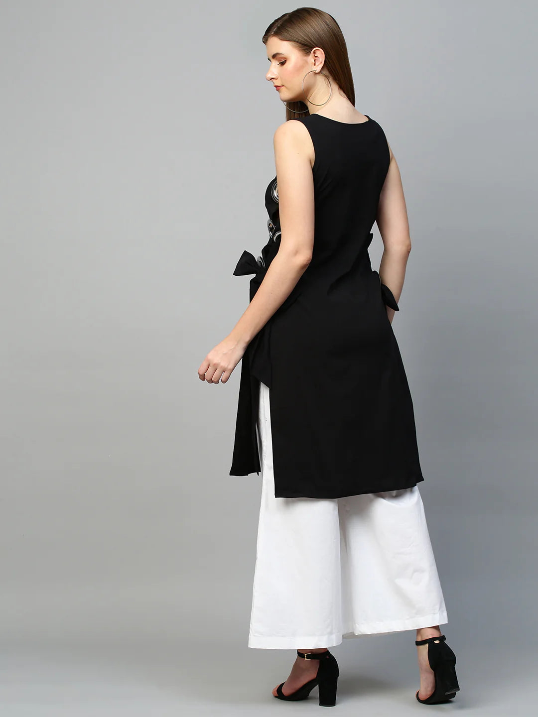 Top with eyelets tie-up feature and flared pants co-ord set