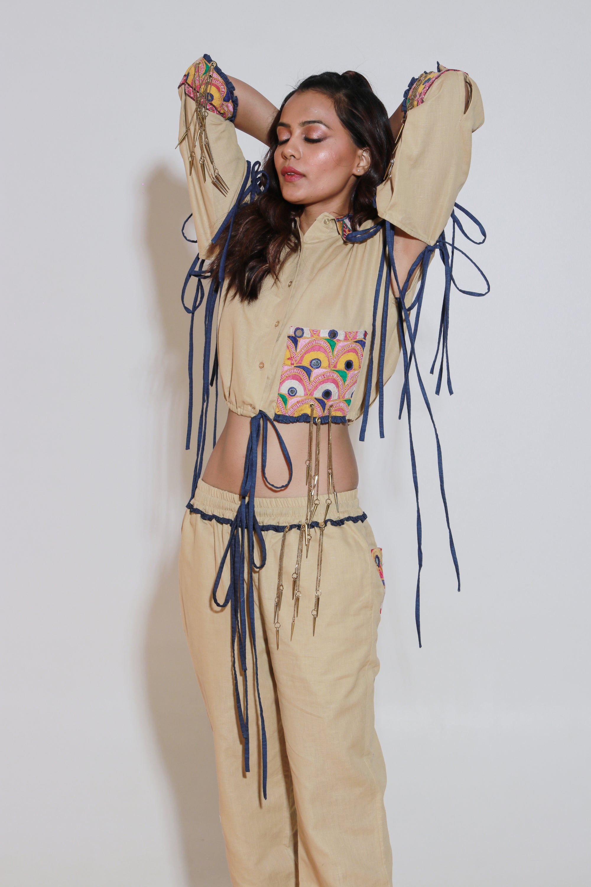 Denim and khaki tie-up crop top and jogger pants