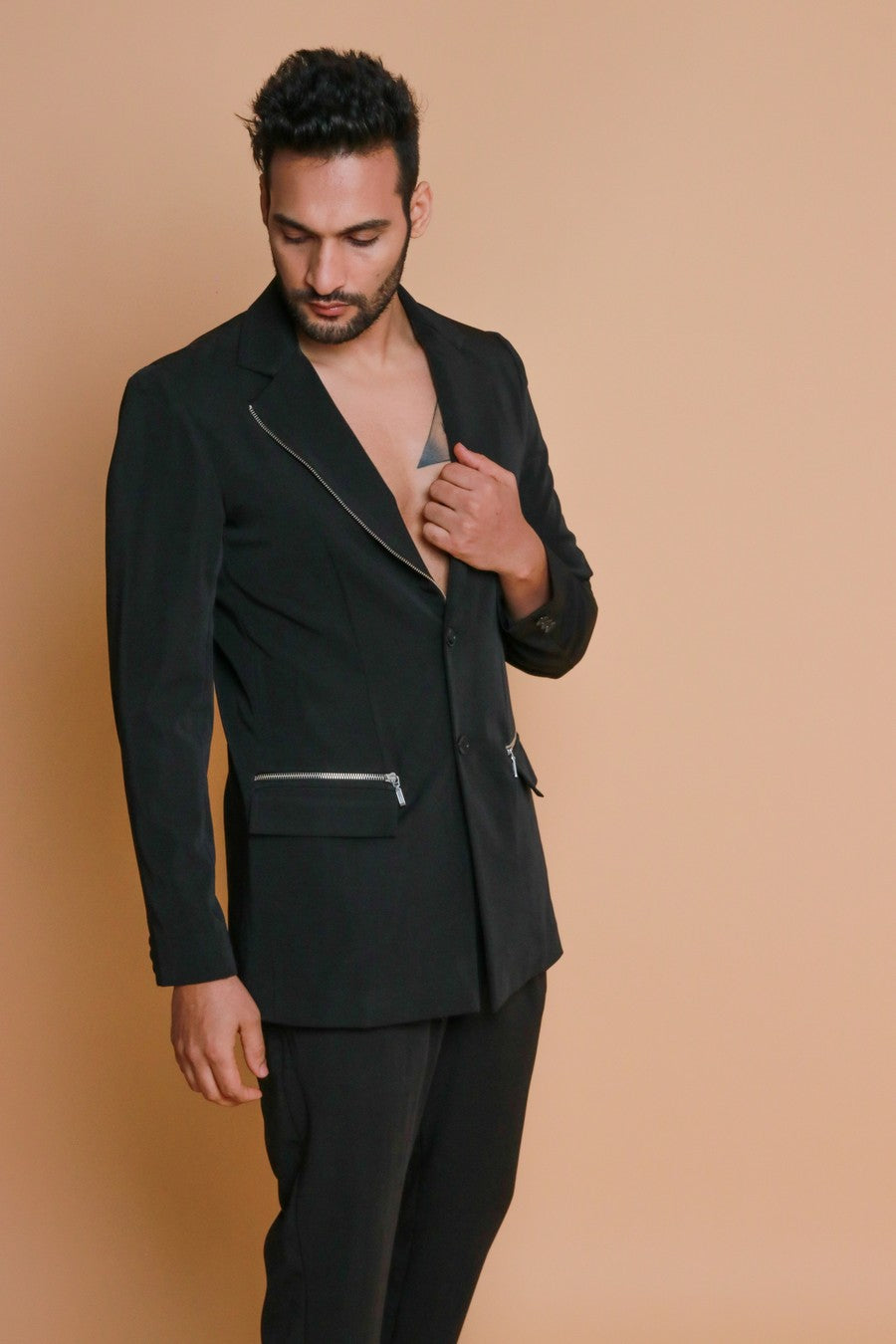 Black jacket with zippers and narrow fitted pants