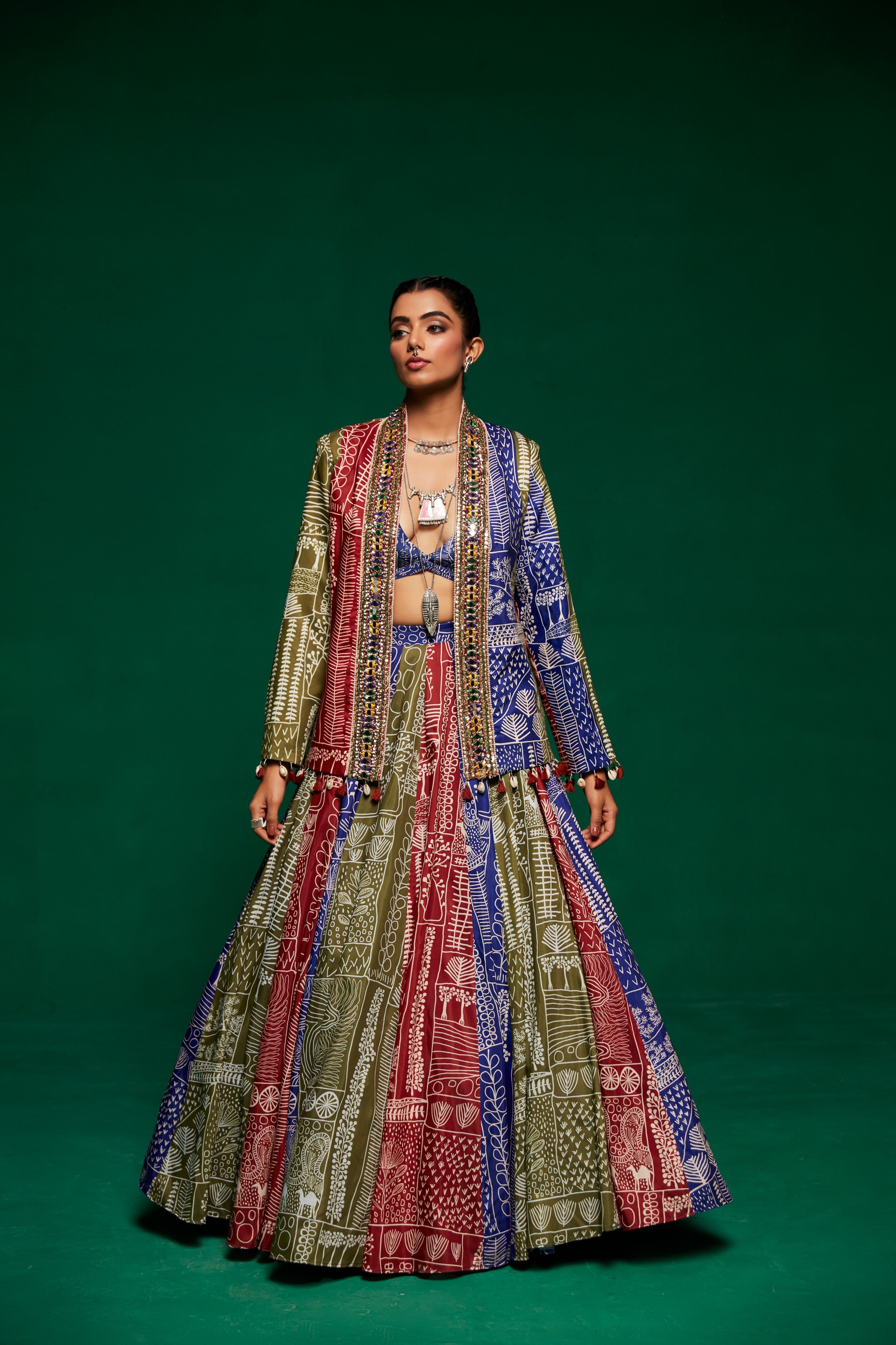 Tri - coloured printed lehenga with bustier and blazer