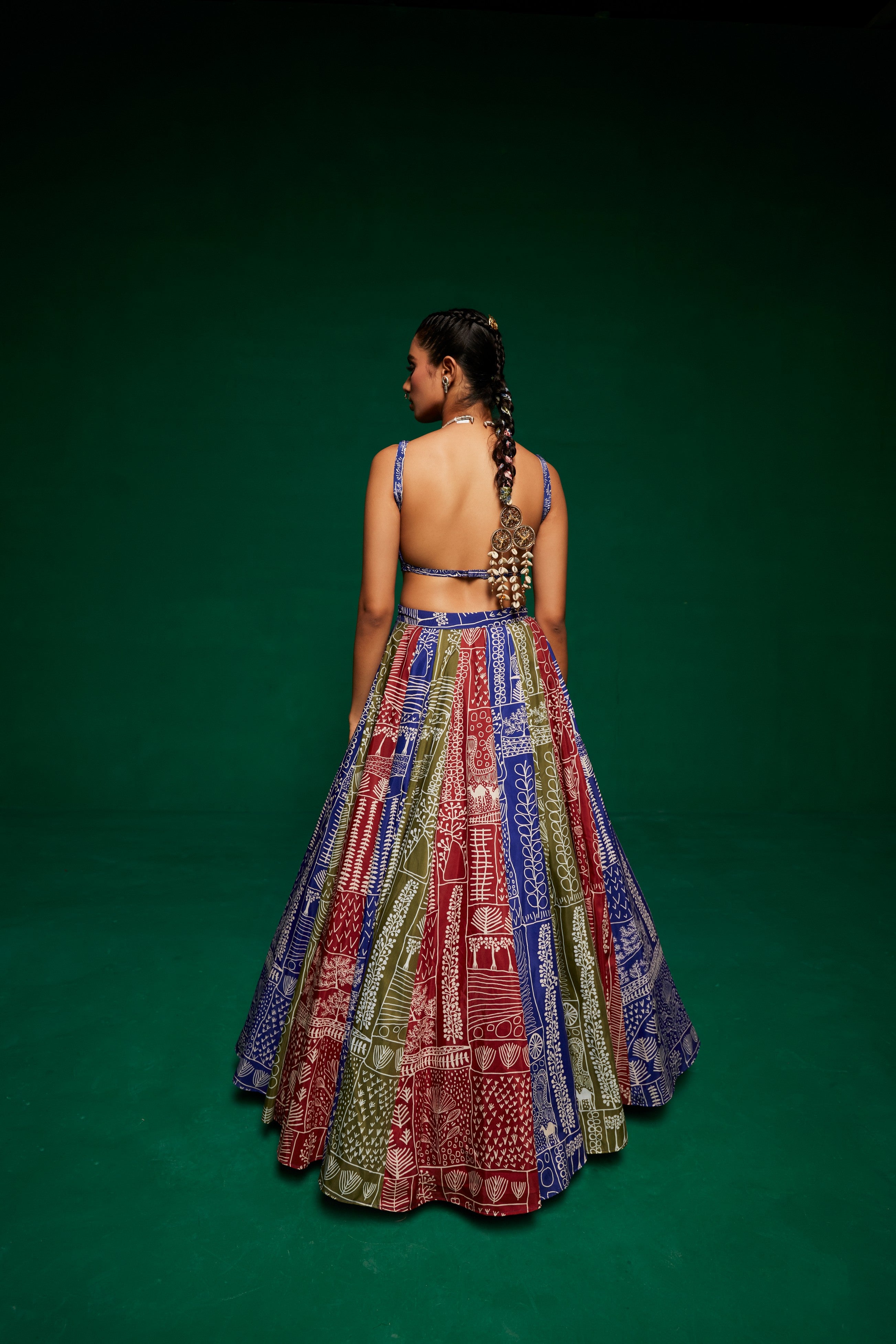 Tri - coloured printed lehenga with bustier and blazer