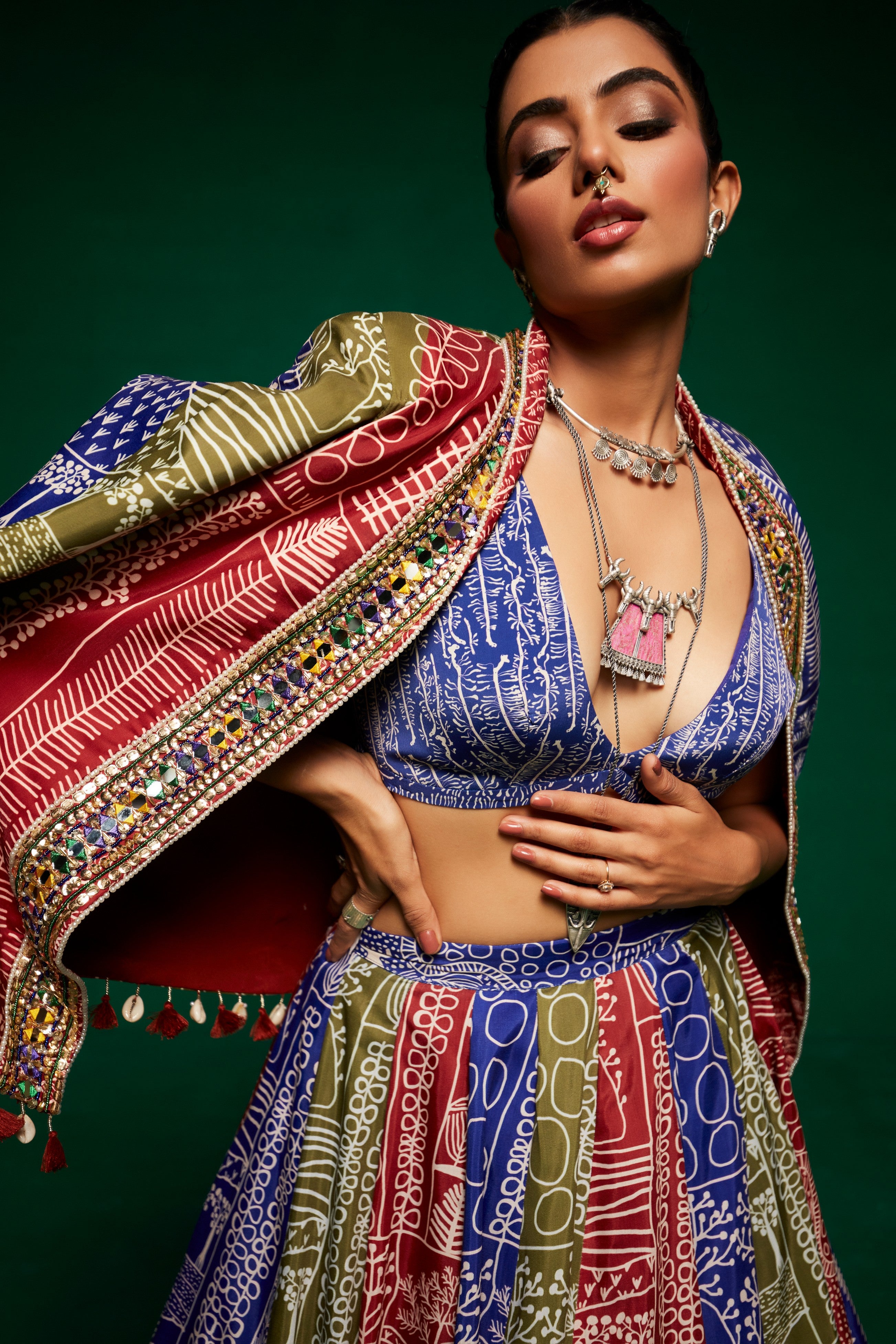 Tri - coloured printed lehenga with bustier and blazer