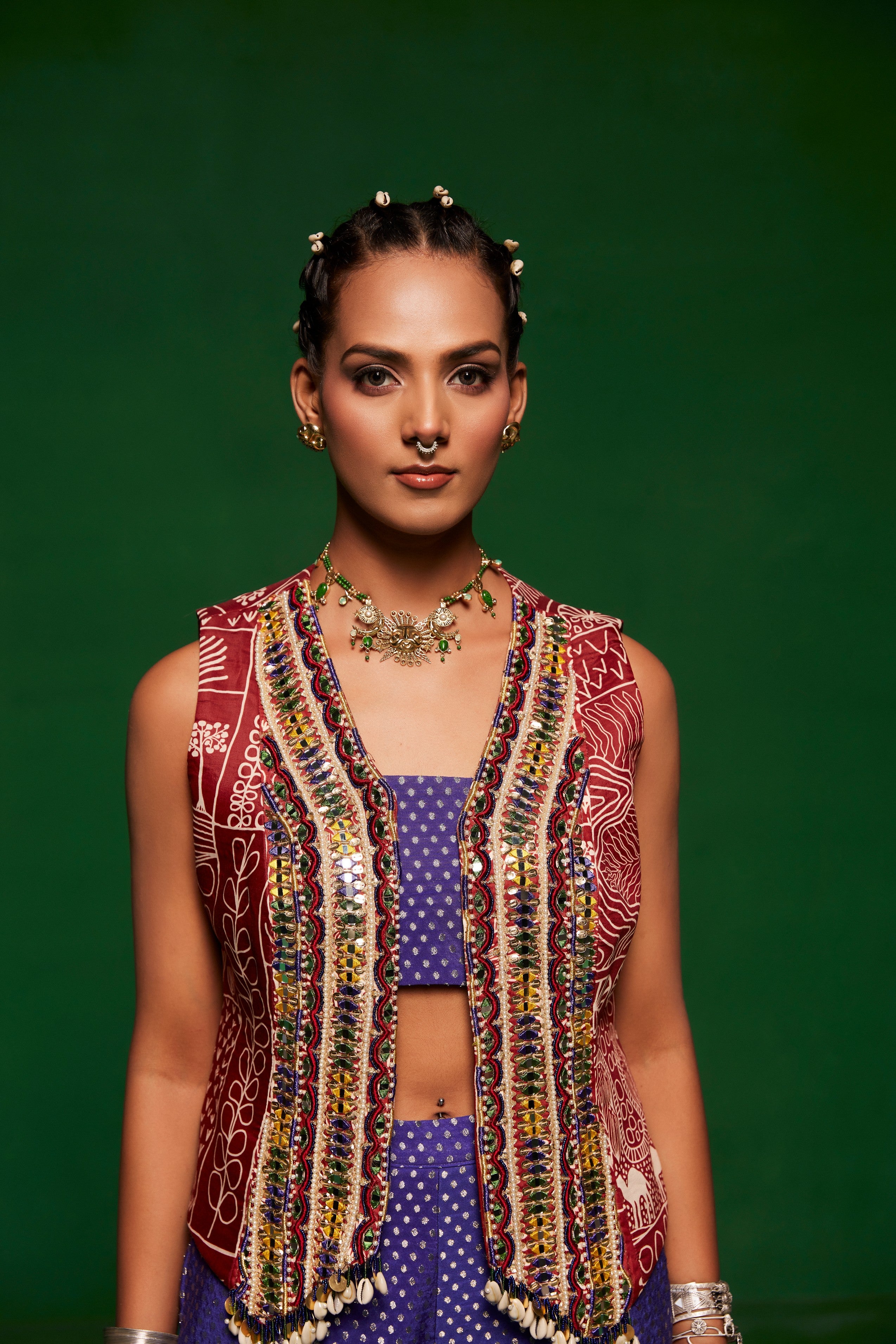 Waist coat paired with pants and a tube top