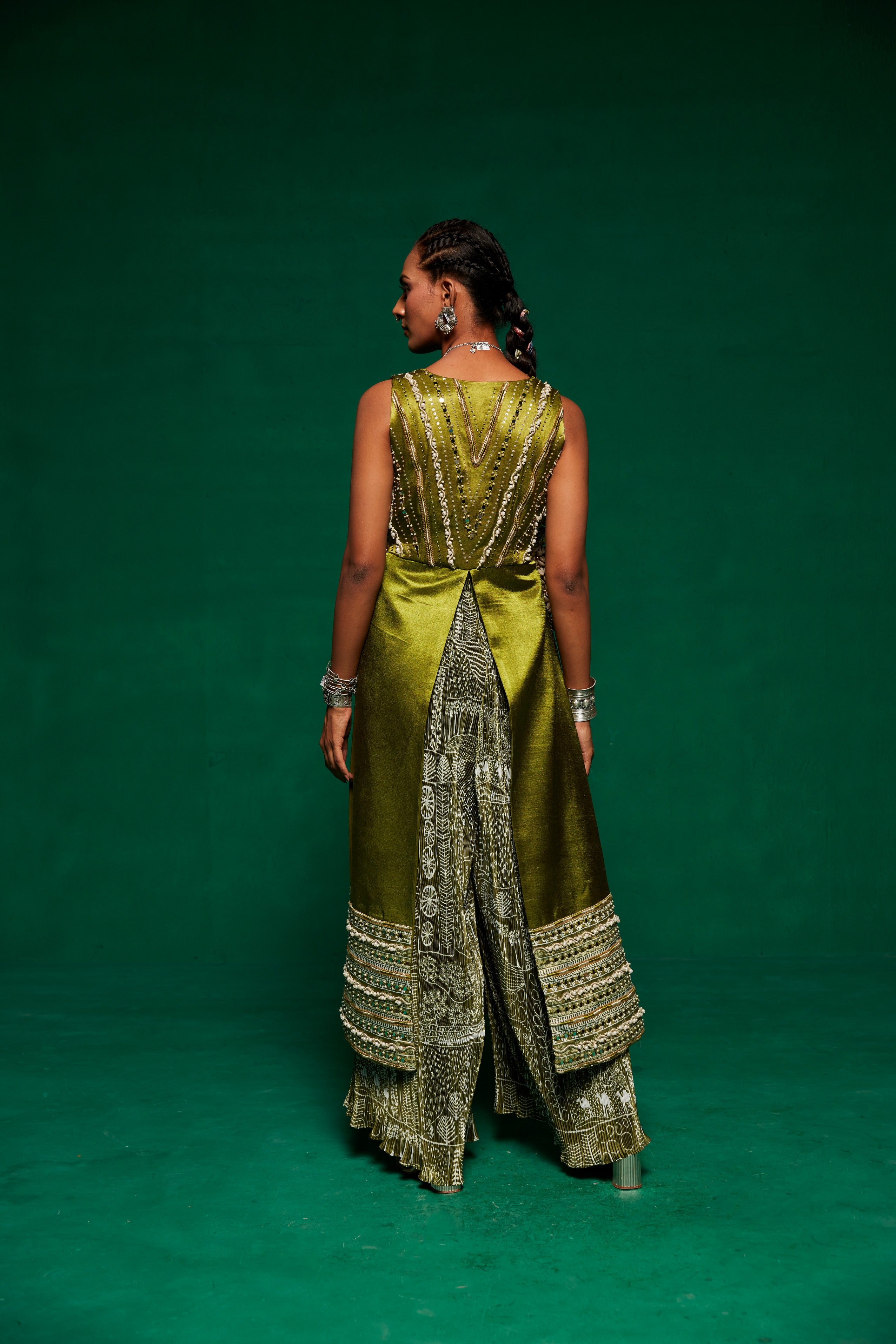 Olive green jumpsuit layered up with a long shrug