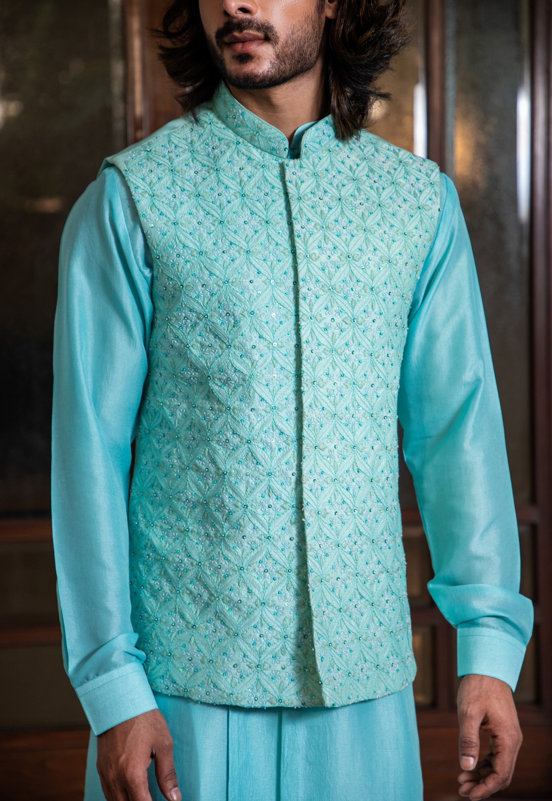 Hand embroidered jacket with sequin highlights and kurta set