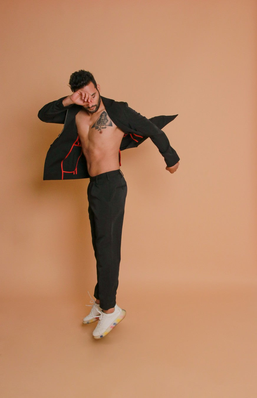Black jacket with zippers and narrow fitted pants