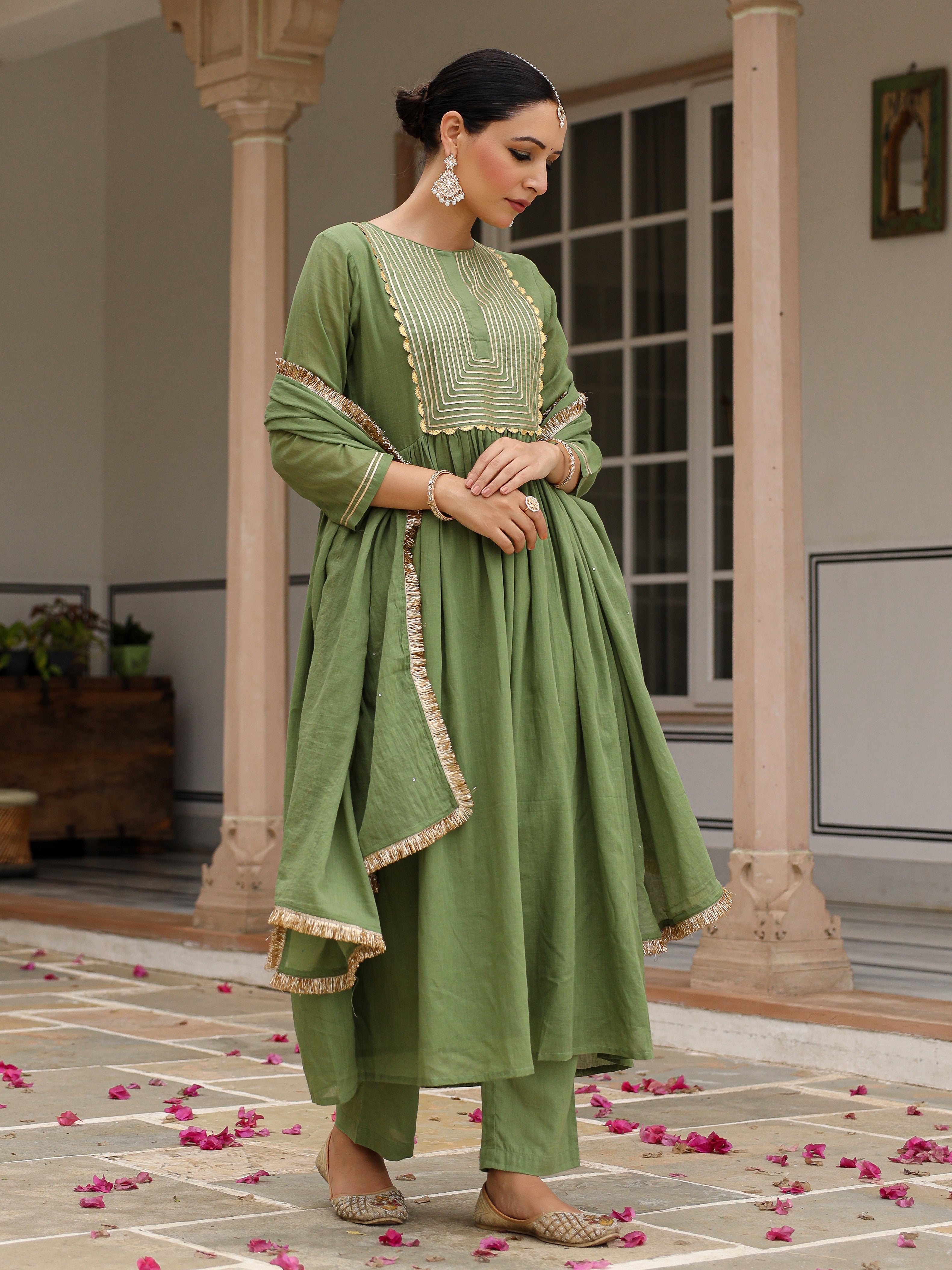 Light green mulmul cotton anarkali kurta set with trousers and dupatta