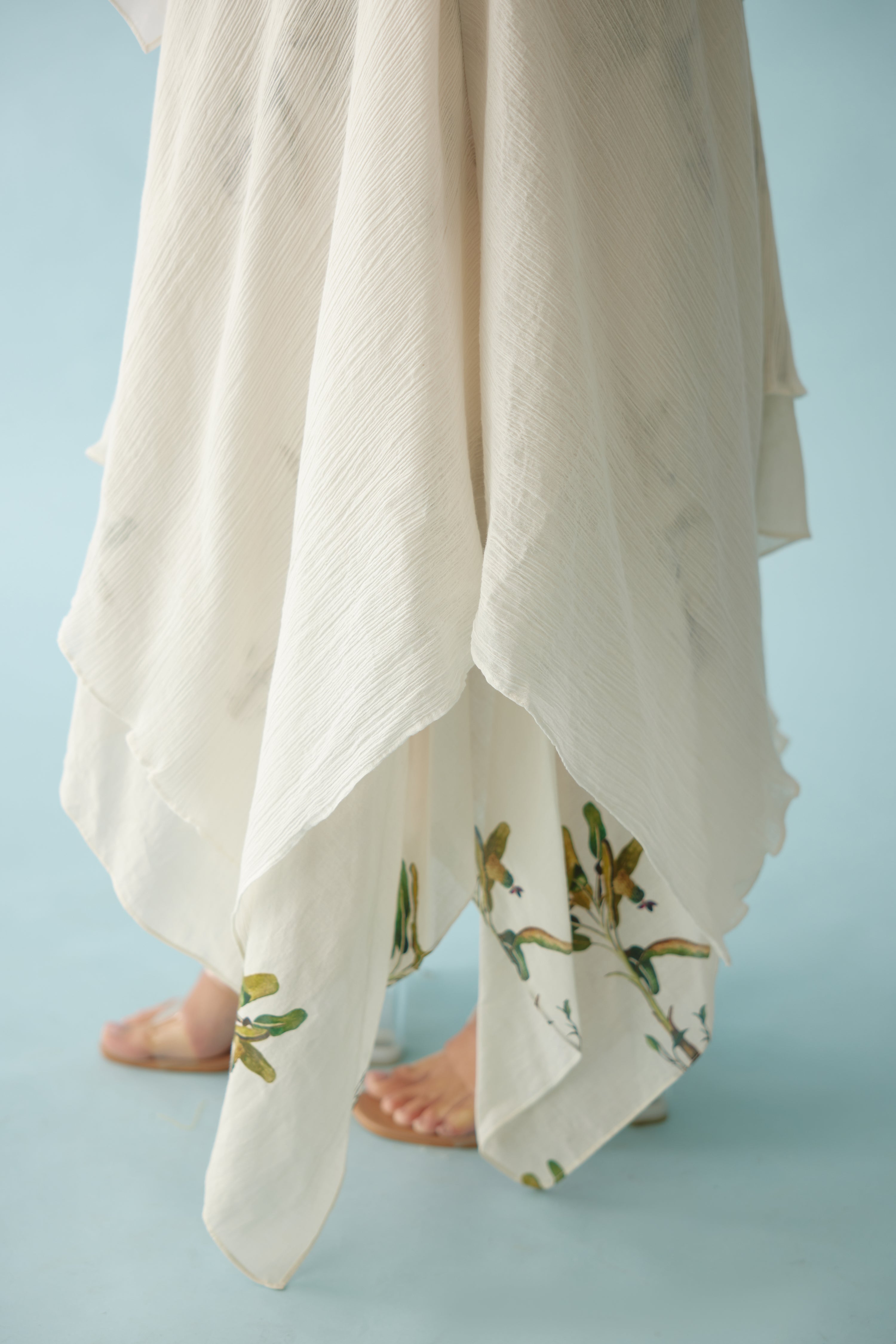 Off-white asymmetrical double layer co-ord sets