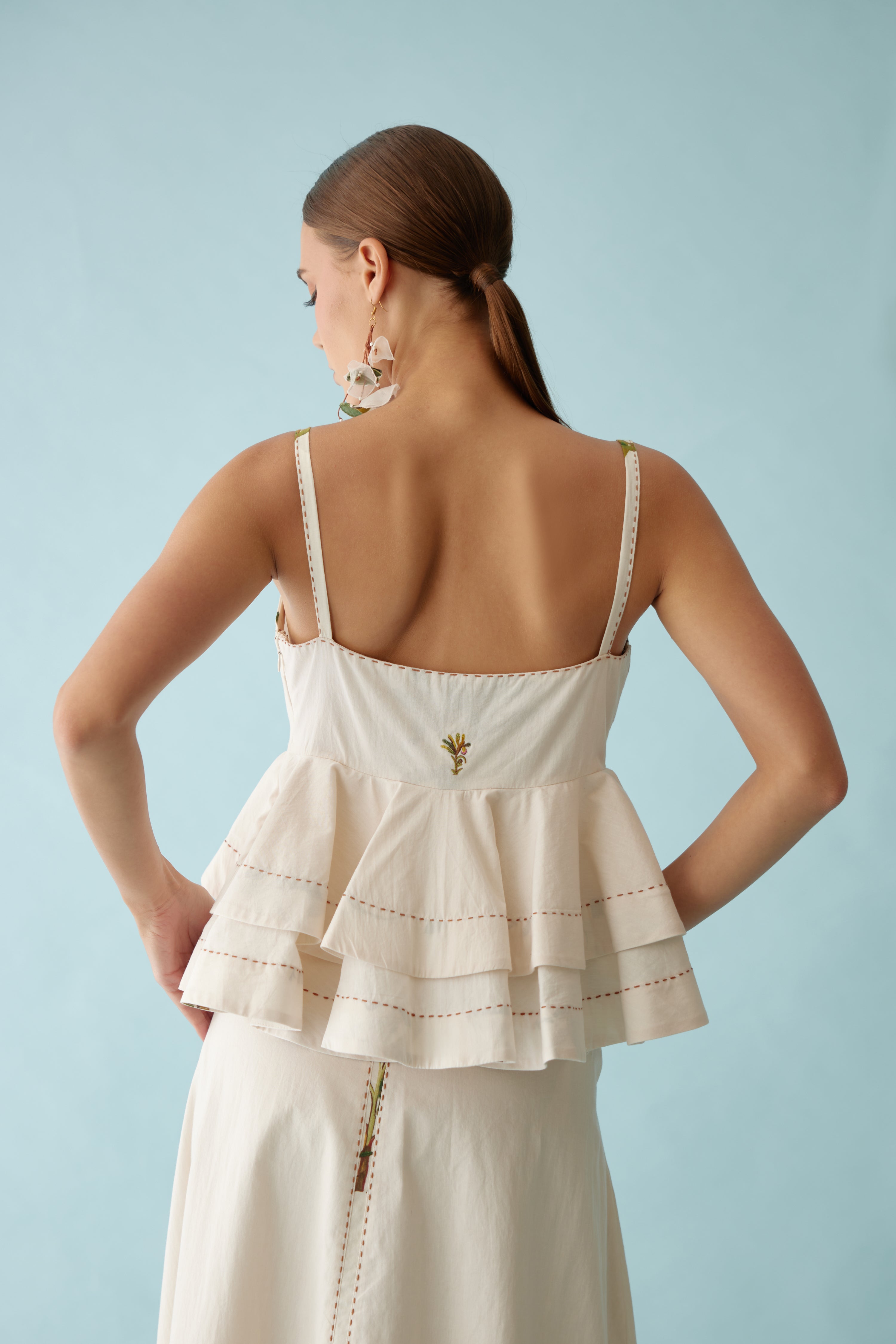 Cream cami peplum top