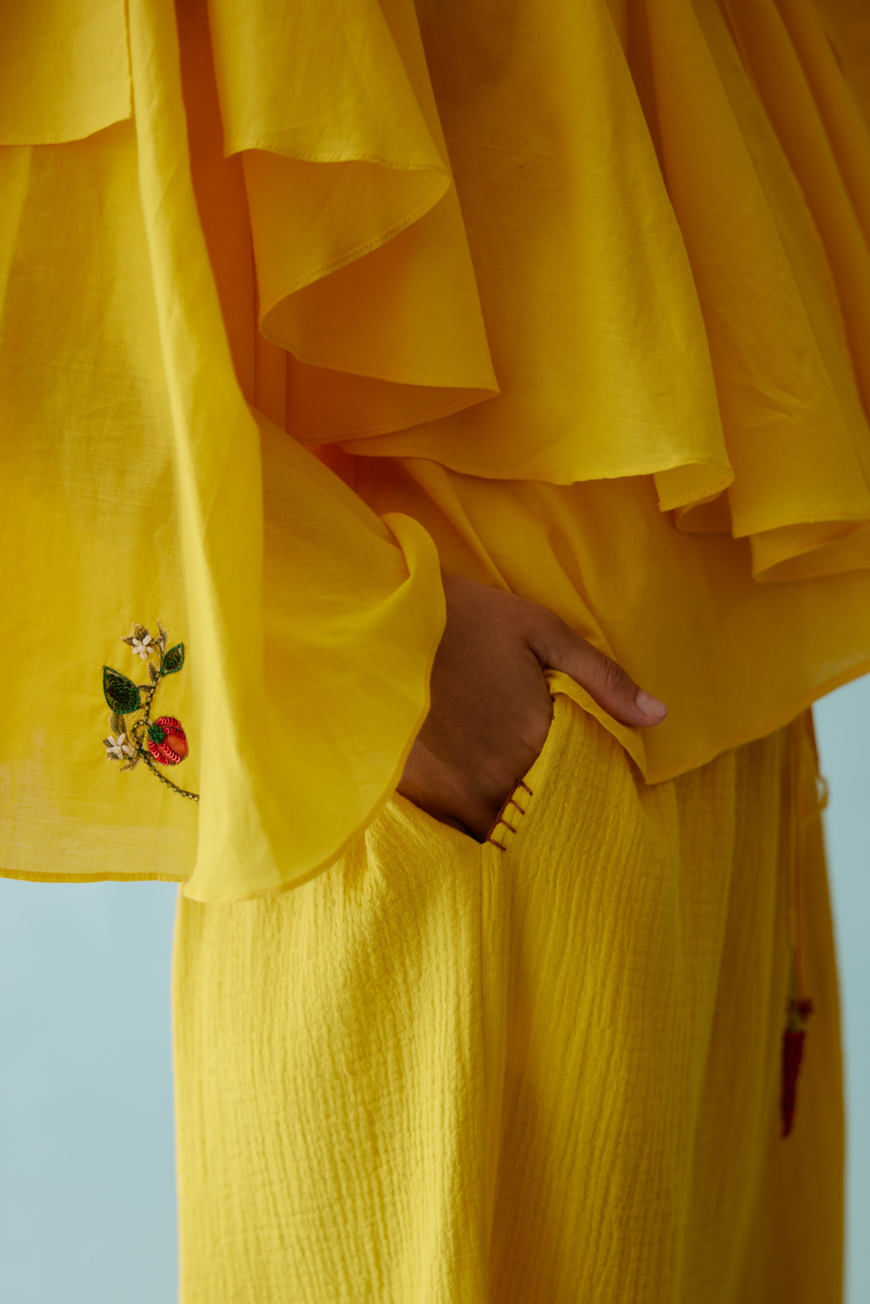 Yellow hand embroidered chilli applique frill top
