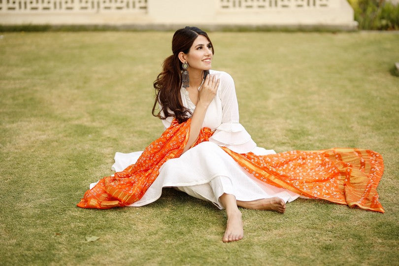 Bright white flared kurta set with bandej dupatta