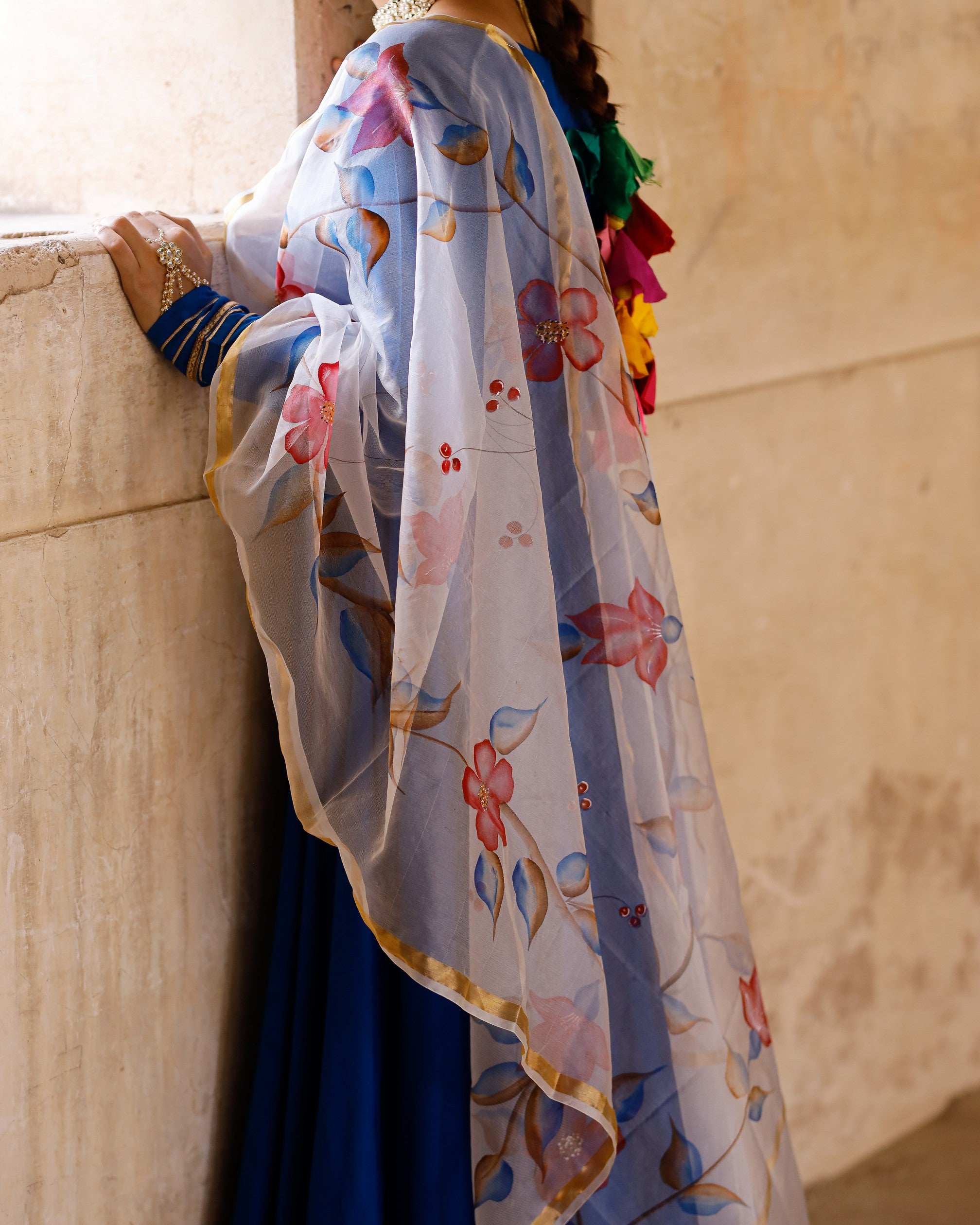 Solid blue anarkali suit set with hand painted organza dupatta