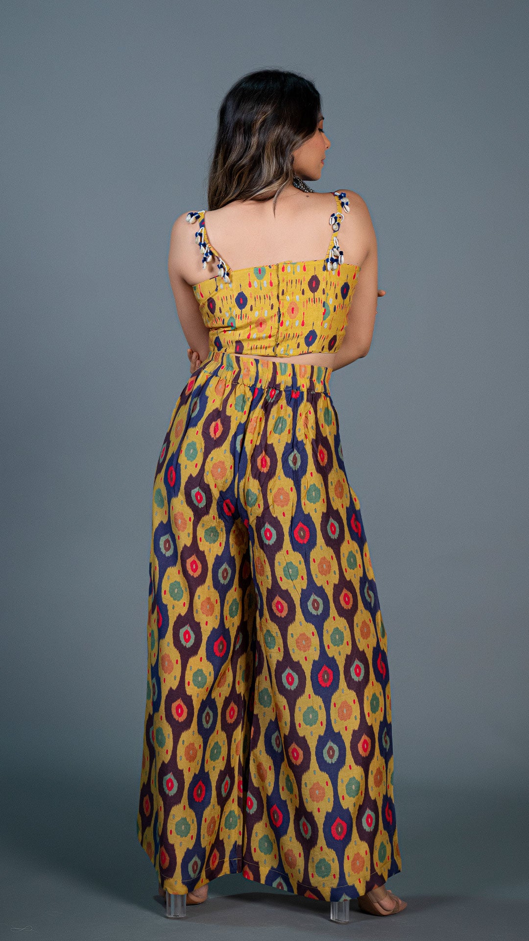 YELLOW IKKAT PRINT PLEATED PANTS IN SILK + SILK EMBELLISHED CROP TOP