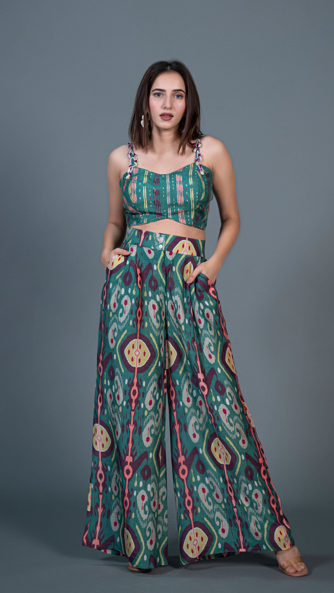 GREEN IKKAT PRINT PLEATED PANTS IN SILK + SILK EMBELLISHED CROP TOP