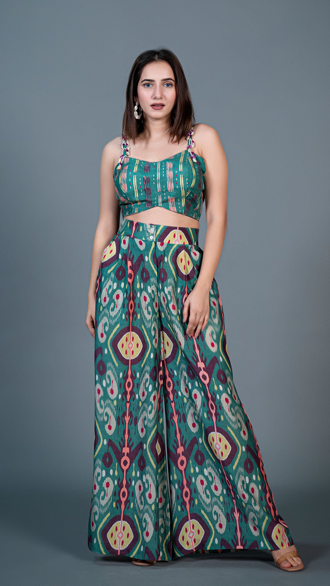 GREEN IKKAT PRINT PLEATED PANTS IN SILK + SILK EMBELLISHED CROP TOP
