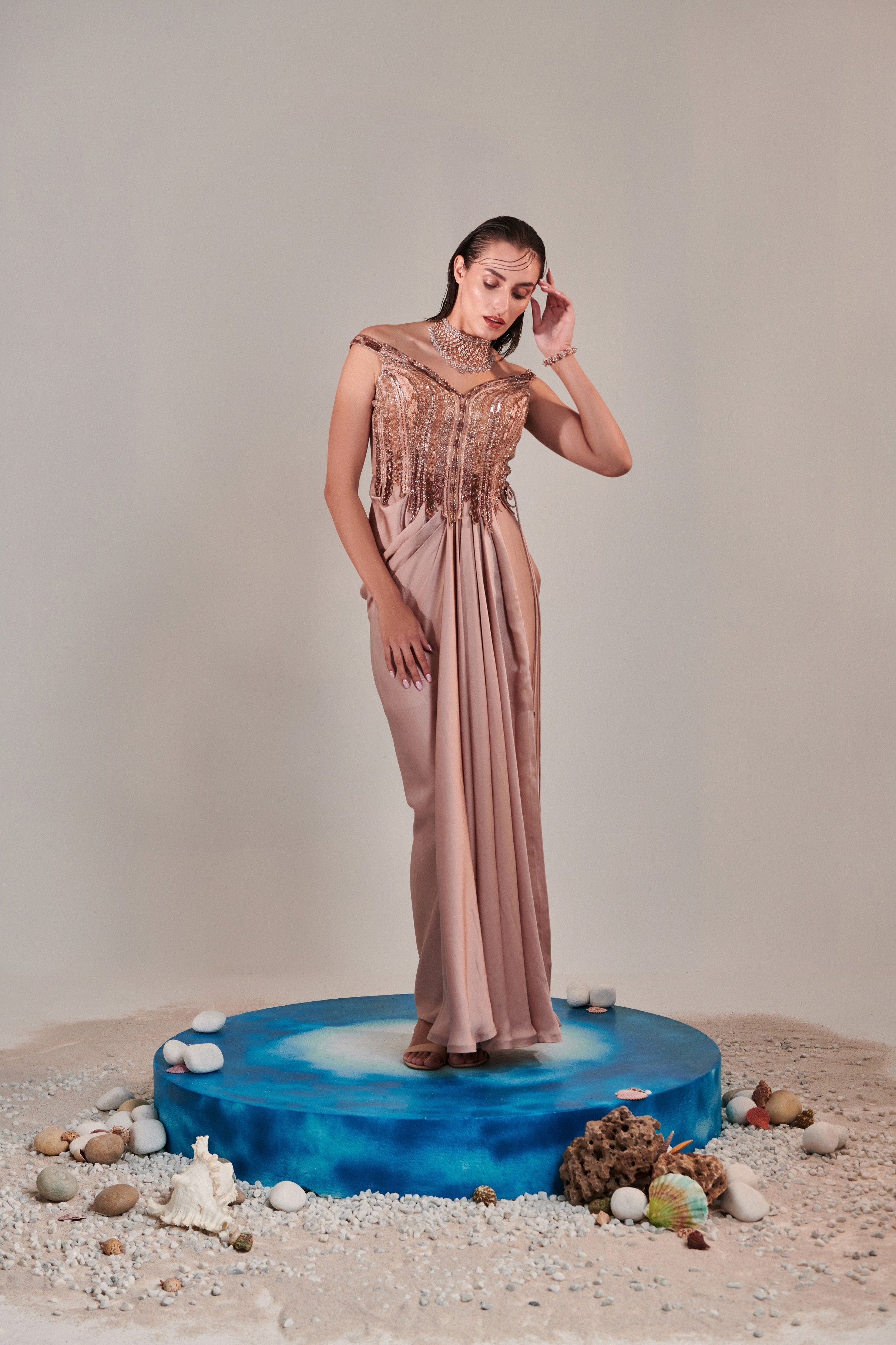 Nudish pink gradient hand embroidered cutwork detail drape gown; side drawstring tie-down