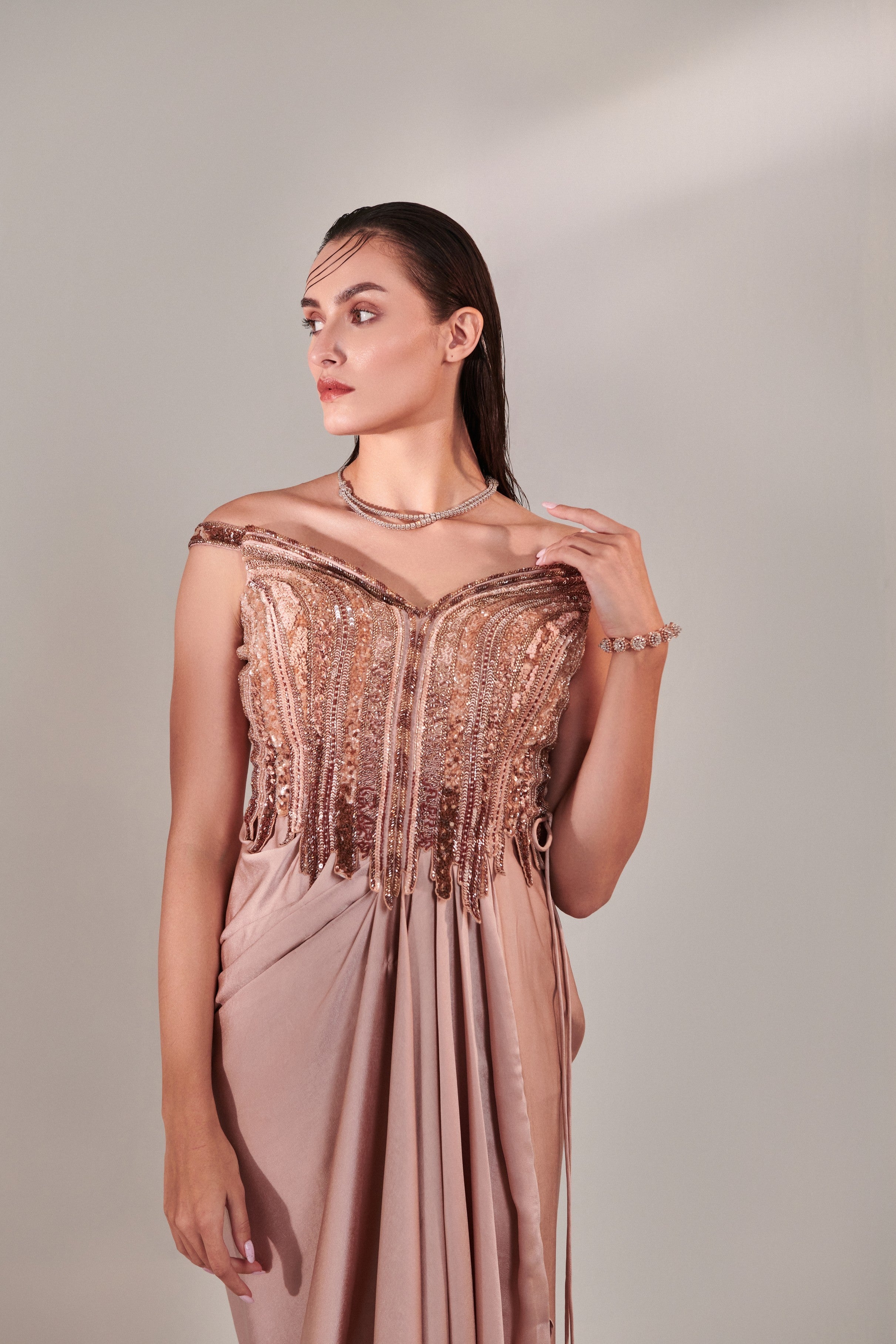 Nudish pink gradient hand embroidered cutwork detail drape gown; side drawstring tie-down