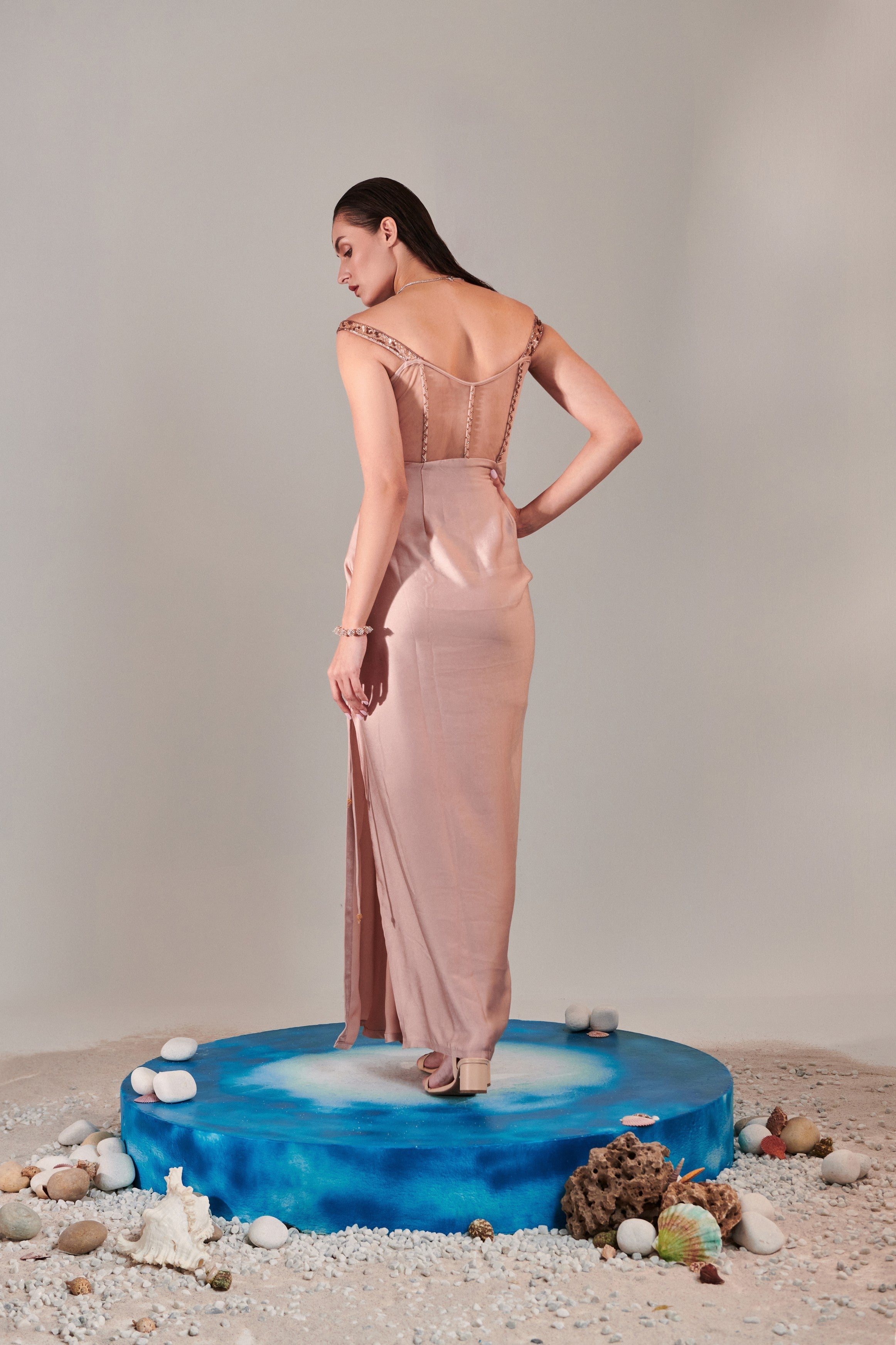 Nudish pink gradient hand embroidered cutwork detail drape gown; side drawstring tie-down