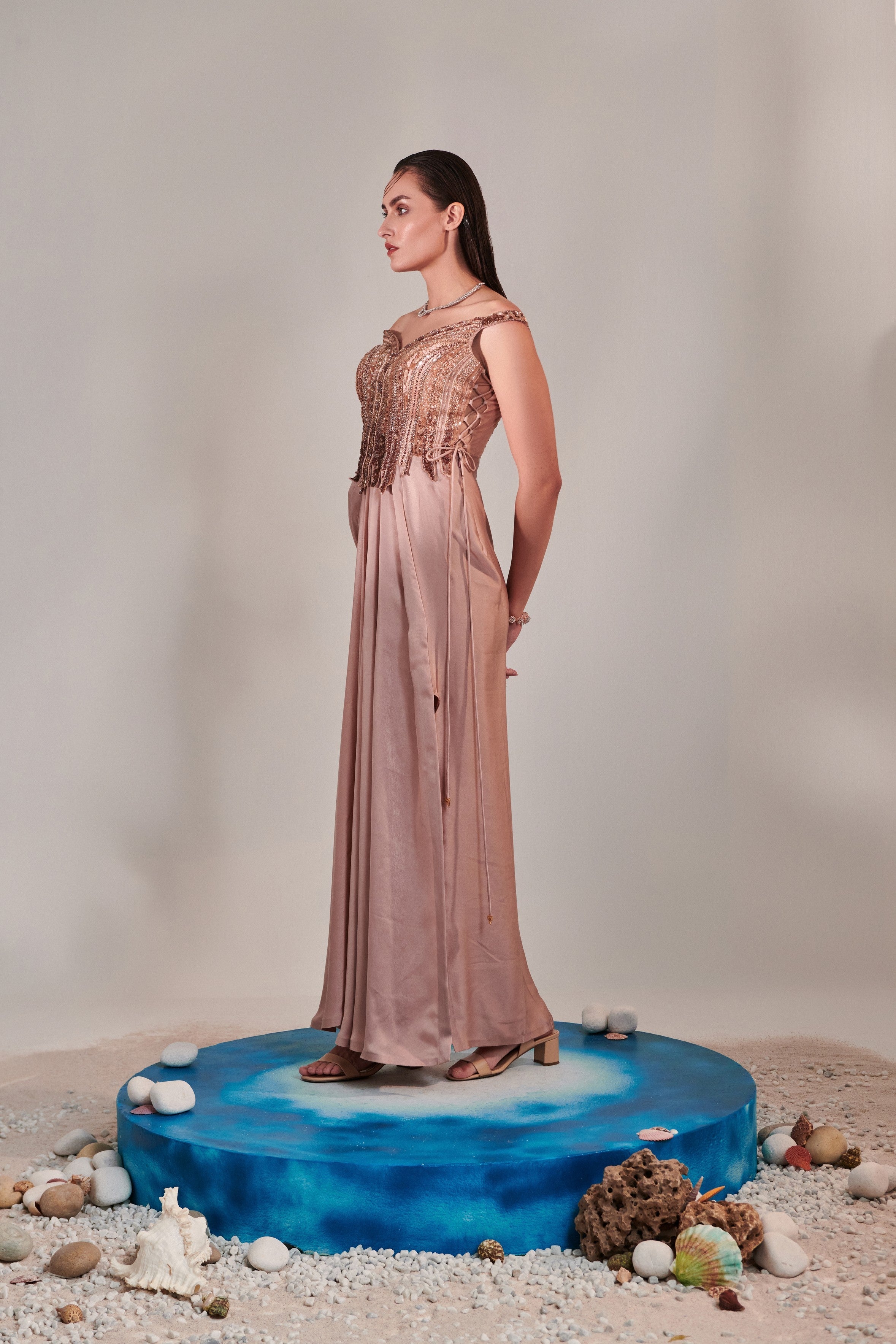 Nudish pink gradient hand embroidered cutwork detail drape gown; side drawstring tie-down