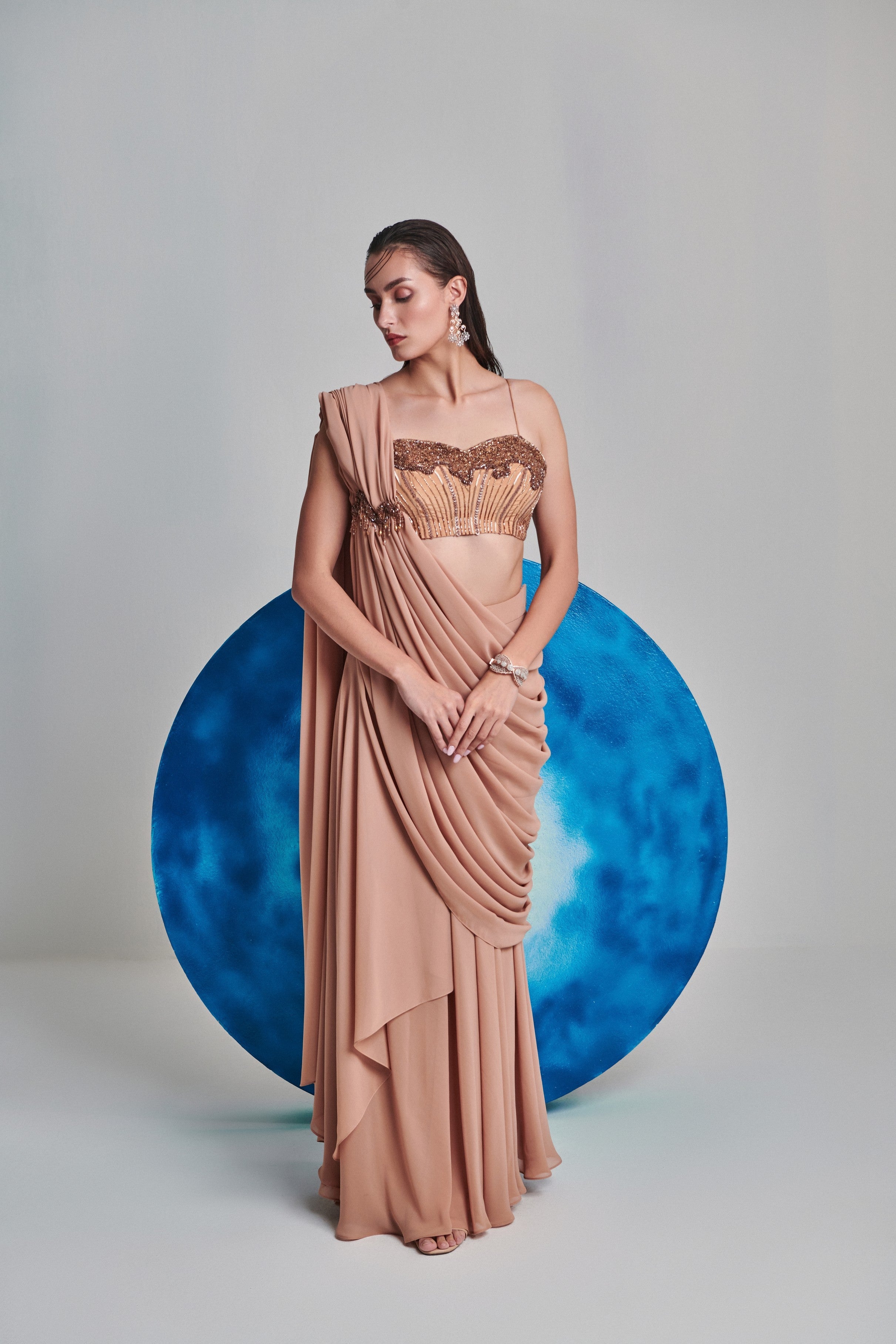 Beige flared pre stitch drape saree; hand embroidered blouse