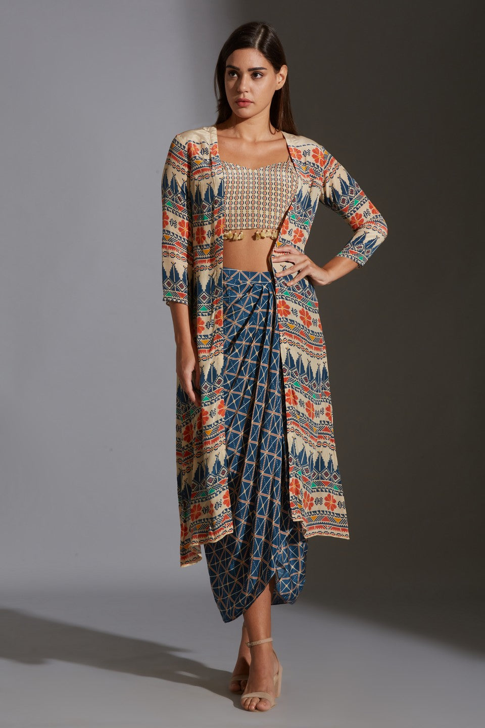 Paired with dhoti drape skirt and jacket