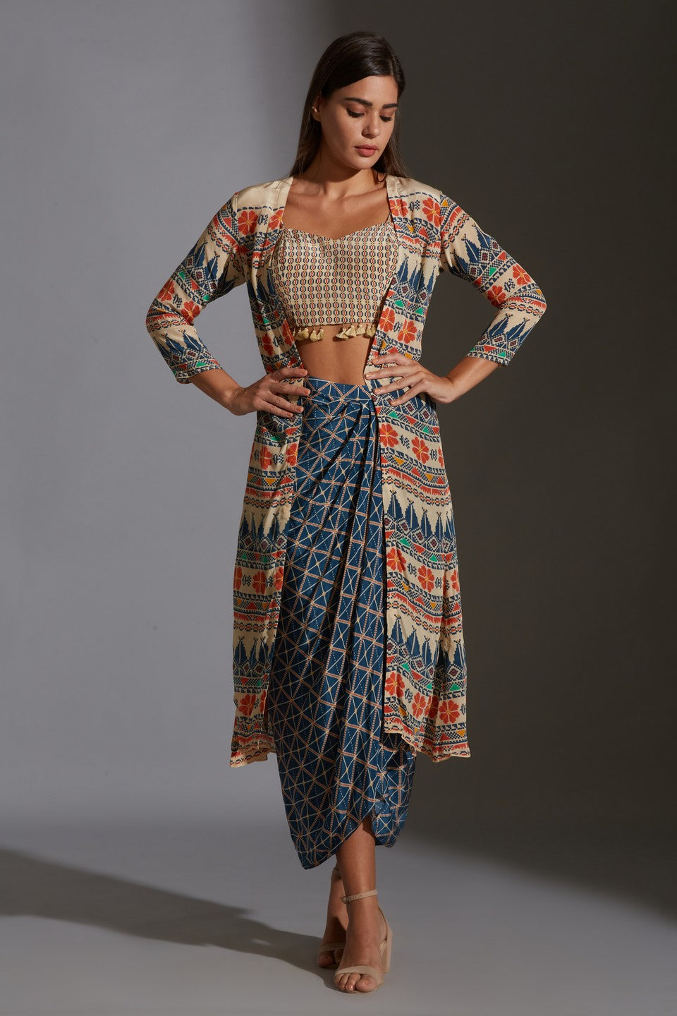 Paired with dhoti drape skirt and jacket