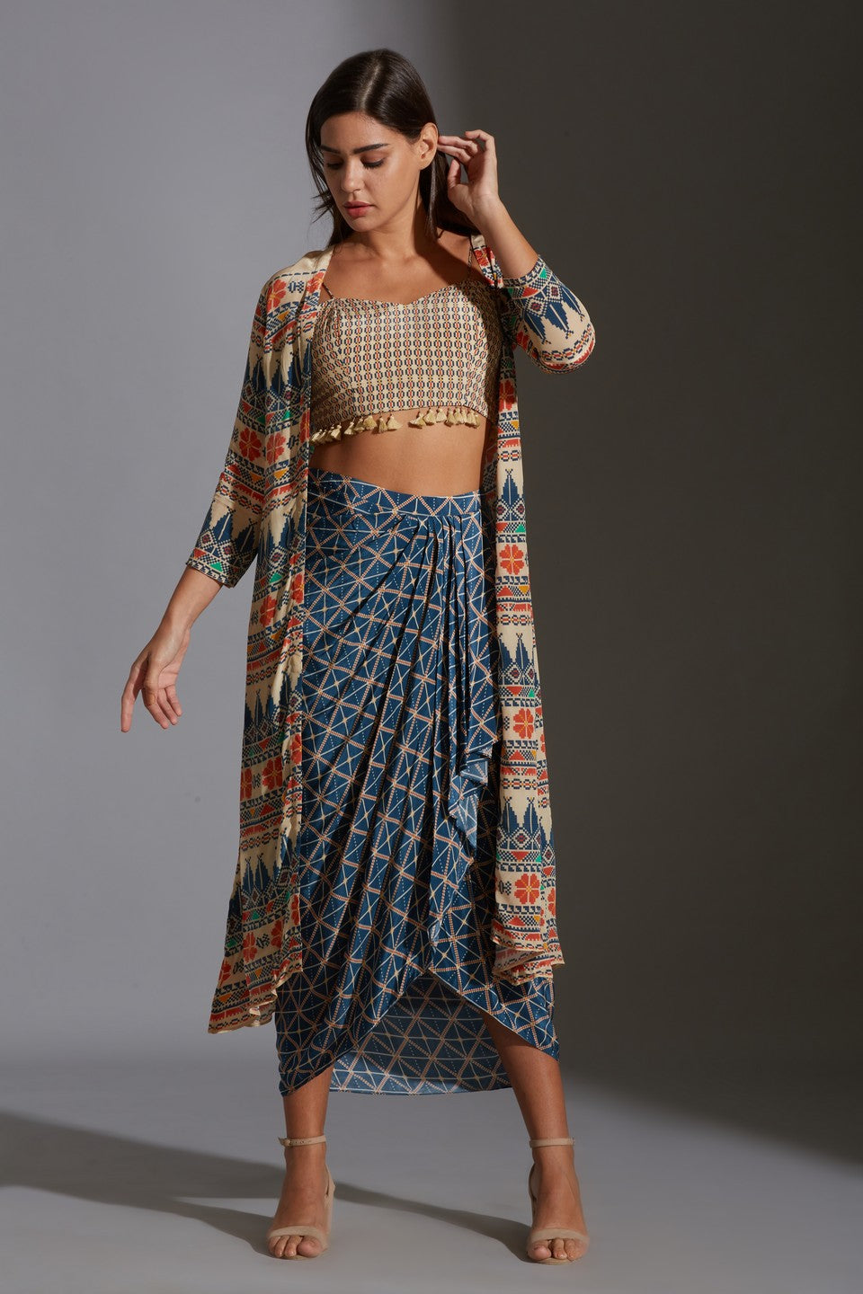 Paired with dhoti drape skirt and jacket