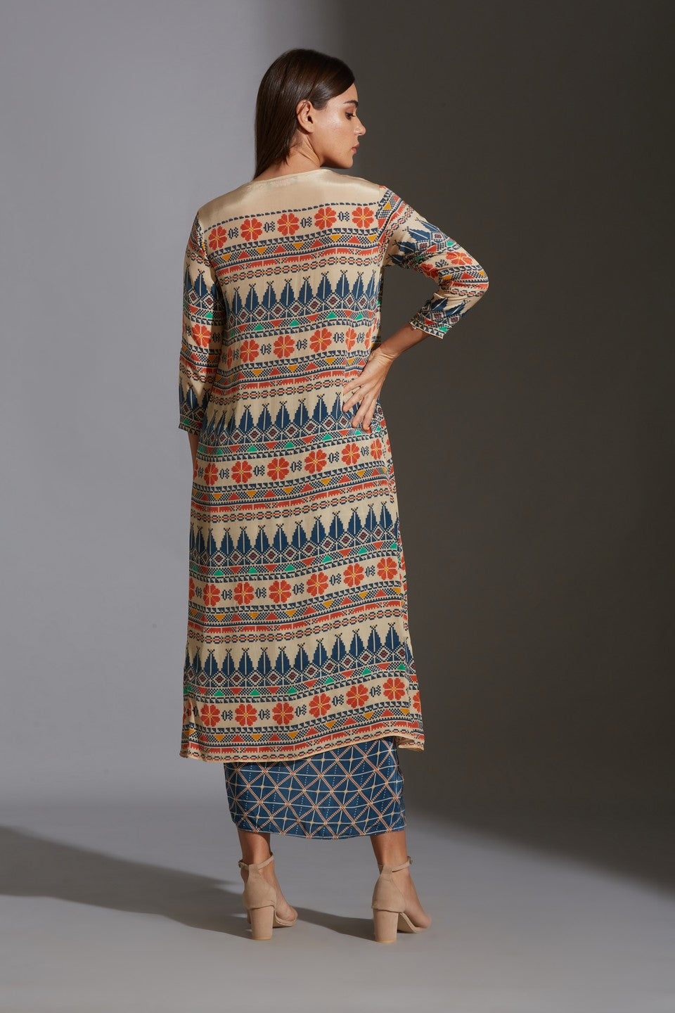 Paired with dhoti drape skirt and jacket