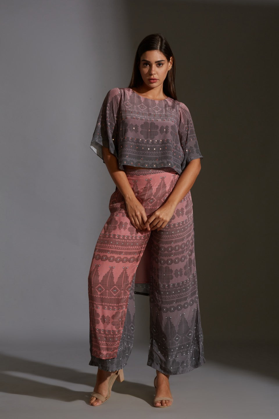 Top with bell sleeves paired with flap pants