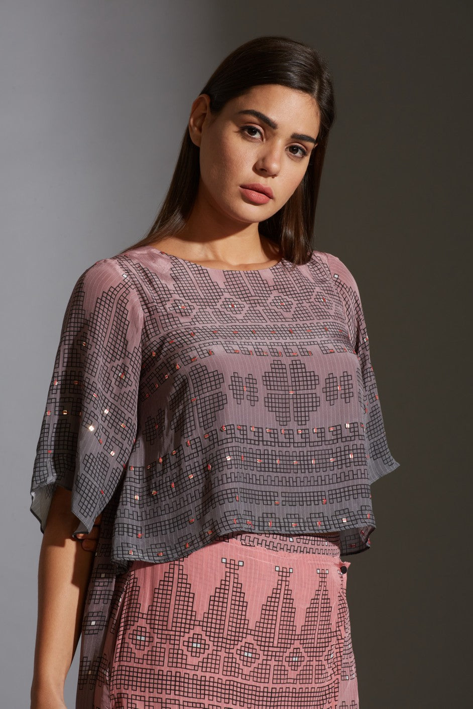 Top with bell sleeves paired with flap pants